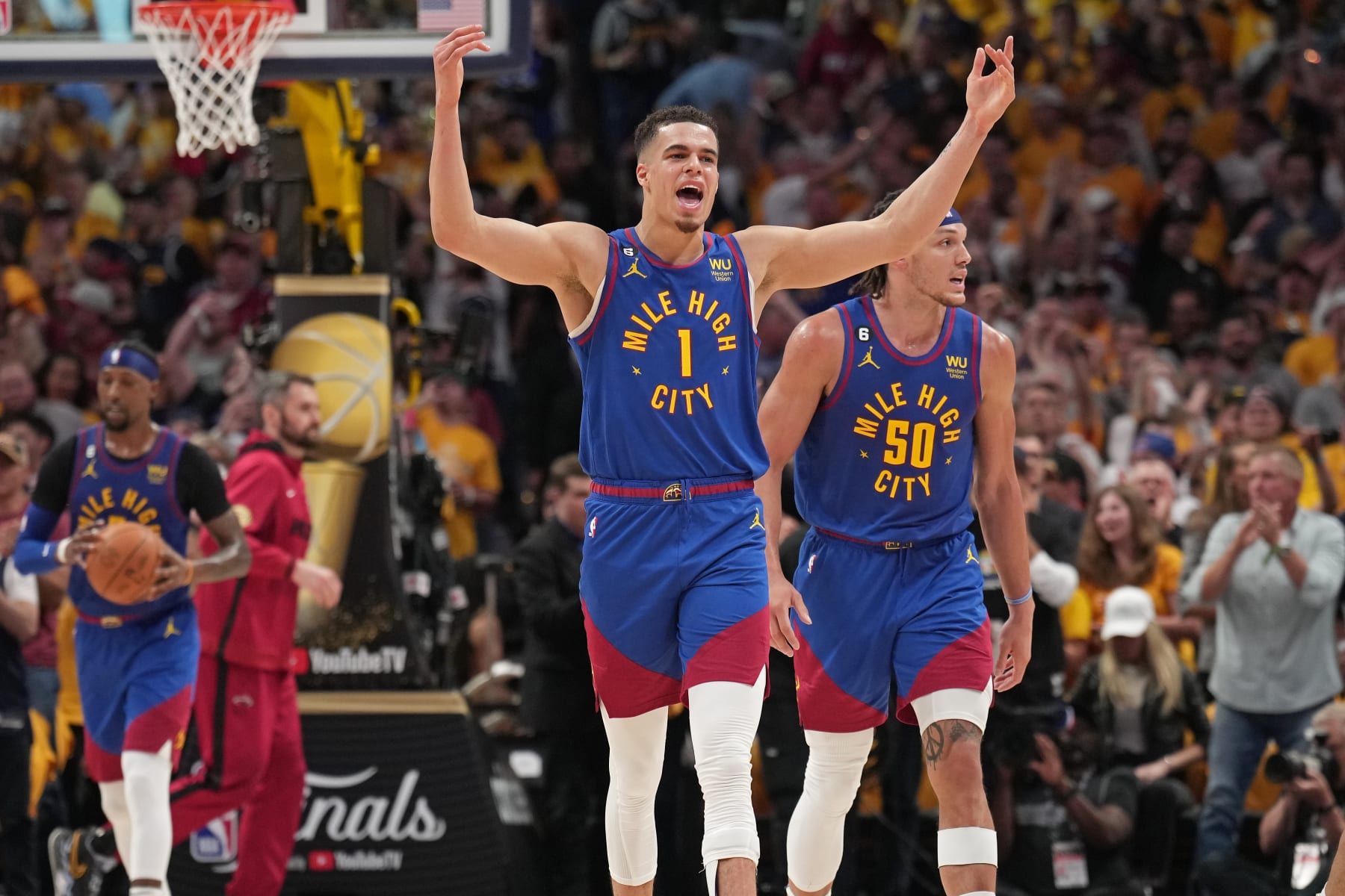 DENVER, CO - JUNE 1: Michael Porter Jr. #1 of the Denver Nuggets celebrates during Game One of the 2023 NBA Finals on June 1, 2023 at the Ball Arena in Denver, Colorado. NOTE TO USER: User expressly acknowledges and agrees that, by downloading and/or using this Photograph, user is consenting to the terms and conditions of the Getty Images License Agreement. Mandatory Copyright Notice: Copyright 2023 NBAE (Photo by Jesse D. Garrabrant/NBAE via Getty Images)