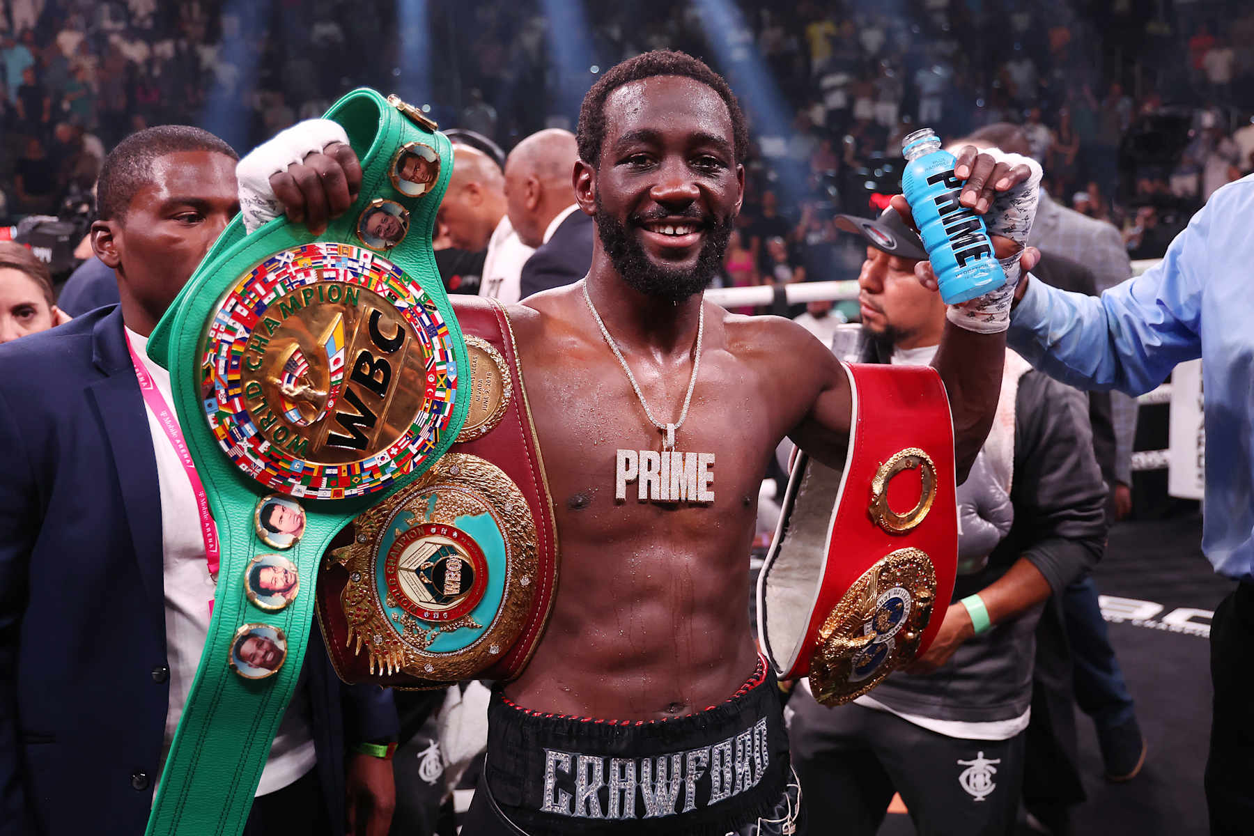 LAS VEGAS, NEVADA - JULY 29: Terence Crawford celebrates with his championship belts after defeating Errol Spence Jr. in the World Welterweight Championship bout at T-Mobile Arena on July 29, 2023 in Las Vegas, Nevada. (Photo by Al Bello/Getty Images)