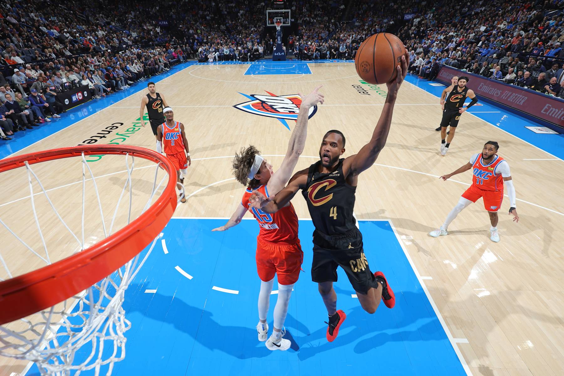 OKLAHOMA CITY, OK - JANUARY 16: Evan Mobley #4 of the Cleveland Cavaliers drives to the basket during the game against the Oklahoma City Thunder on January 16, 2025 at Paycom Center in Oklahoma City, Oklahoma. NOTE TO USER: User expressly acknowledges and agrees that, by downloading and or using this photograph, User is consenting to the terms and conditions of the Getty Images License Agreement. Mandatory Copyright Notice: Copyright 2025 NBAE (Photo by Jeff Haynes/NBAE via Getty Images)