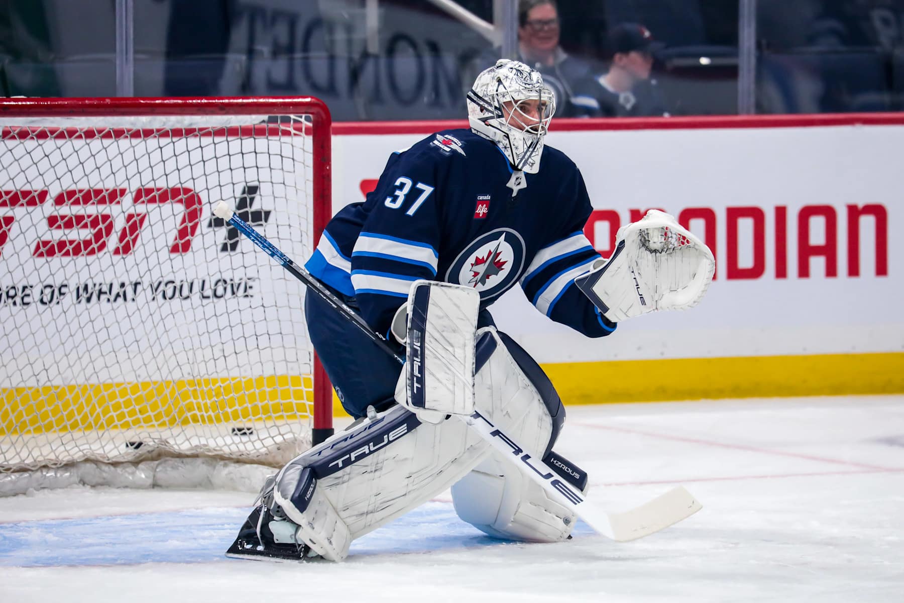 WINNIPEG, CANADA - OCTOBER 13: Goaltender Connor Hellebuyck #37 of the Winnipeg Jets takes part in the pre-game warm up prior to NHL action against the Minnesota Wild at the Canada Life Centre on October 13, 2024 in Winnipeg, Manitoba, Canada. (Photo by Darcy Finley/NHLI via Getty Images)