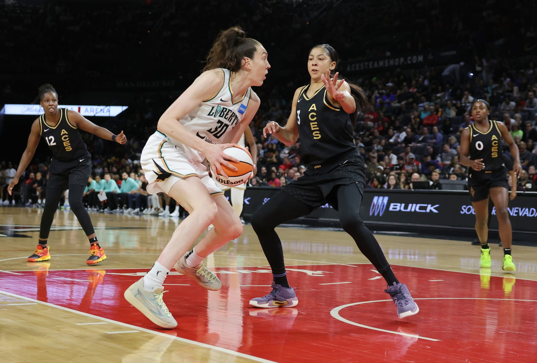 LAS VEGAS, NEVADA - JUNE 29: Candace Parker #3 of the Las Vegas Aces guards Breanna Stewart #30 of the New York Liberty in the third quarter of their game at Michelob ULTRA Arena on June 29, 2023 in Las Vegas, Nevada. The Aces defeated the Liberty 98-81. NOTE TO USER: User expressly acknowledges and agrees that, by downloading and or using this photograph, User is consenting to the terms and conditions of the Getty Images License Agreement. (Photo by Ethan Miller/Getty Images)