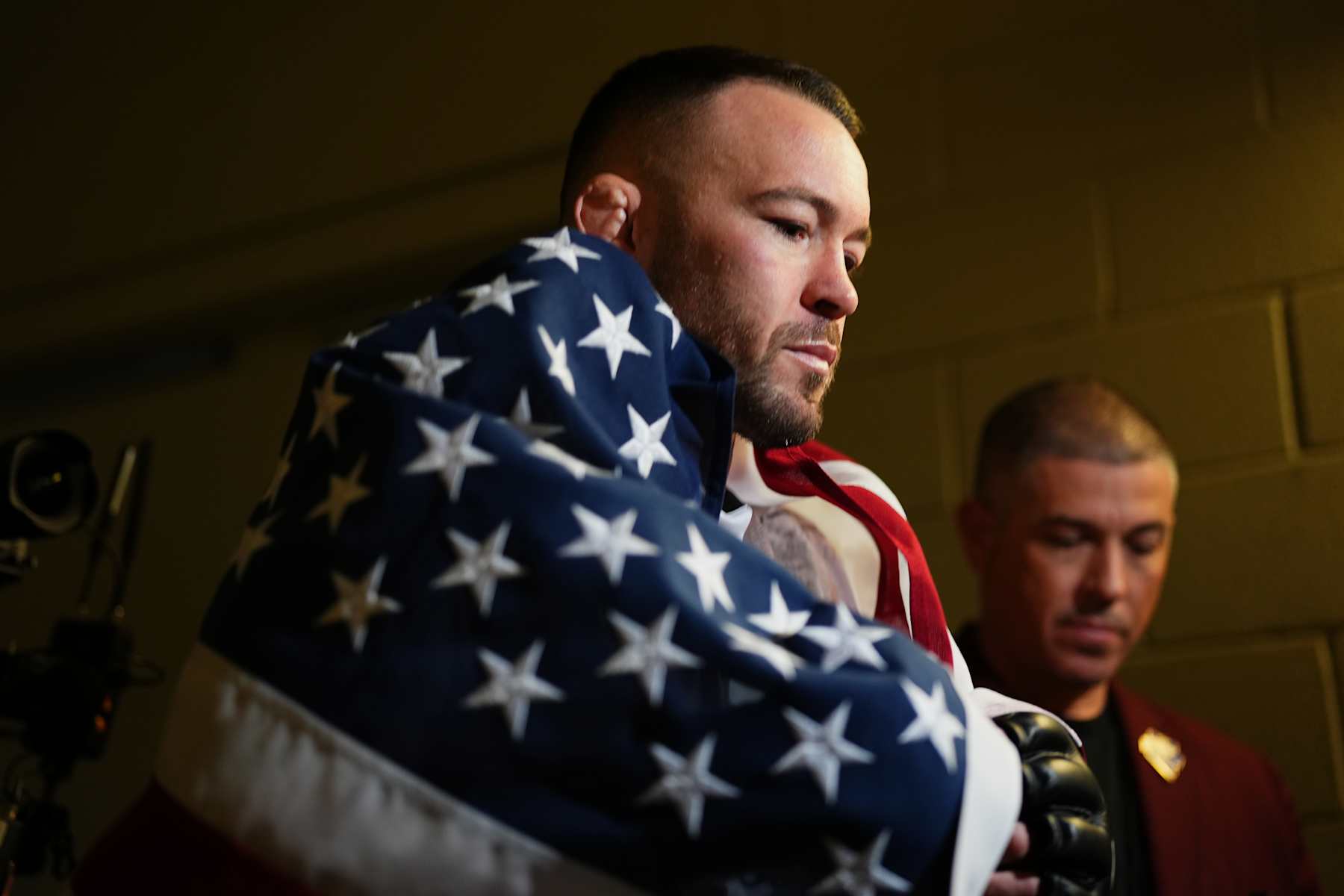 LAS VEGAS, NEVADA - DECEMBER 16: Colby Covington walks to the Octagon in the UFC welterweight championship fight during the UFC 296 event at T-Mobile Arena on December 16, 2023 in Las Vegas, Nevada. (Photo by Cooper Neill/Zuffa LLC via Getty Images)
