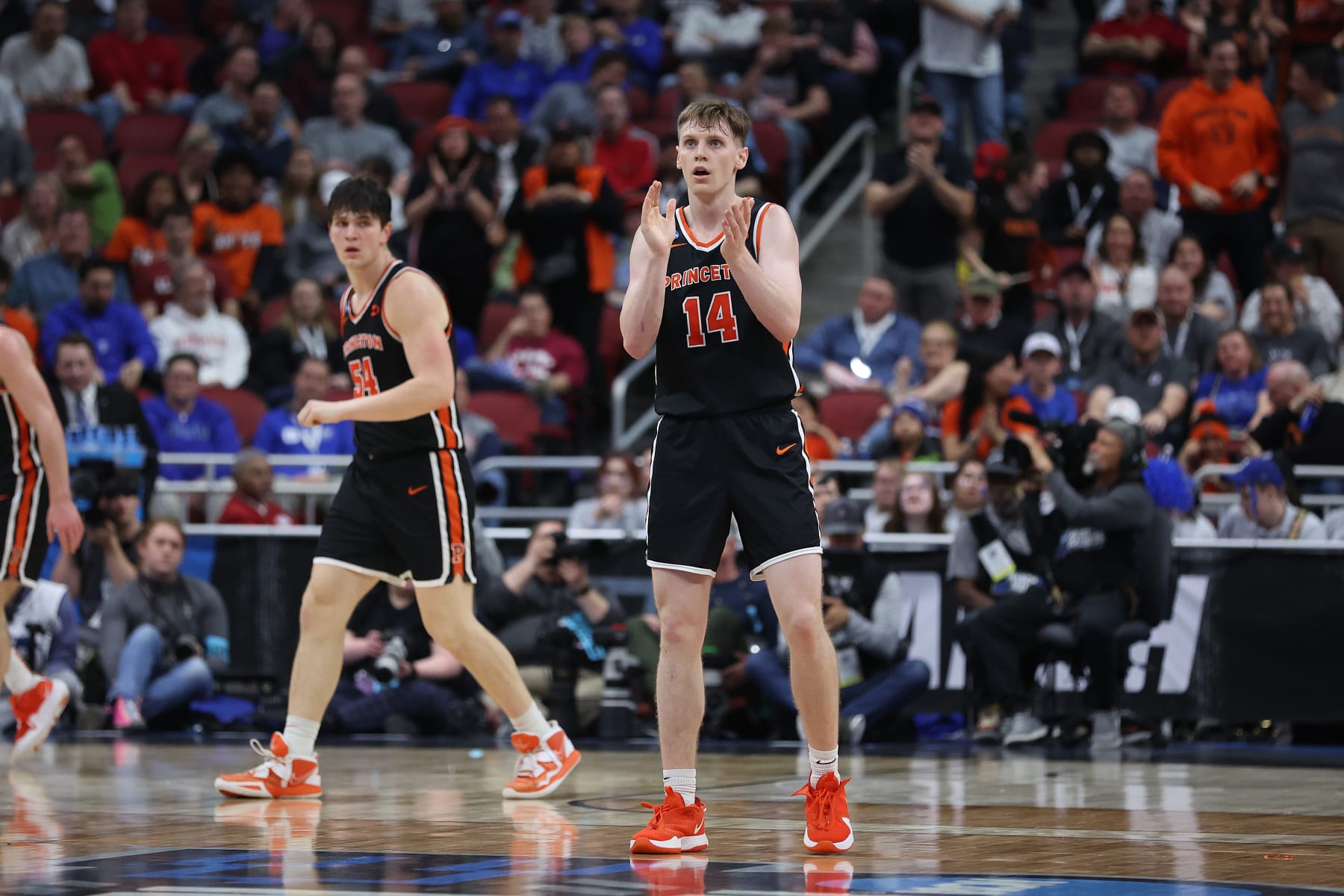 LOUISVILLE, KENTUCKY - MARCH 24: Matt Allocco #14 of the Princeton Tigers reacts during the first half in the Sweet 16 round of the NCAA Men's Basketball Tournament at KFC YUM! Center against the Creighton Bluejays on March 24, 2023 in Louisville, Kentucky. (Photo by Rob Carr/Getty Images)