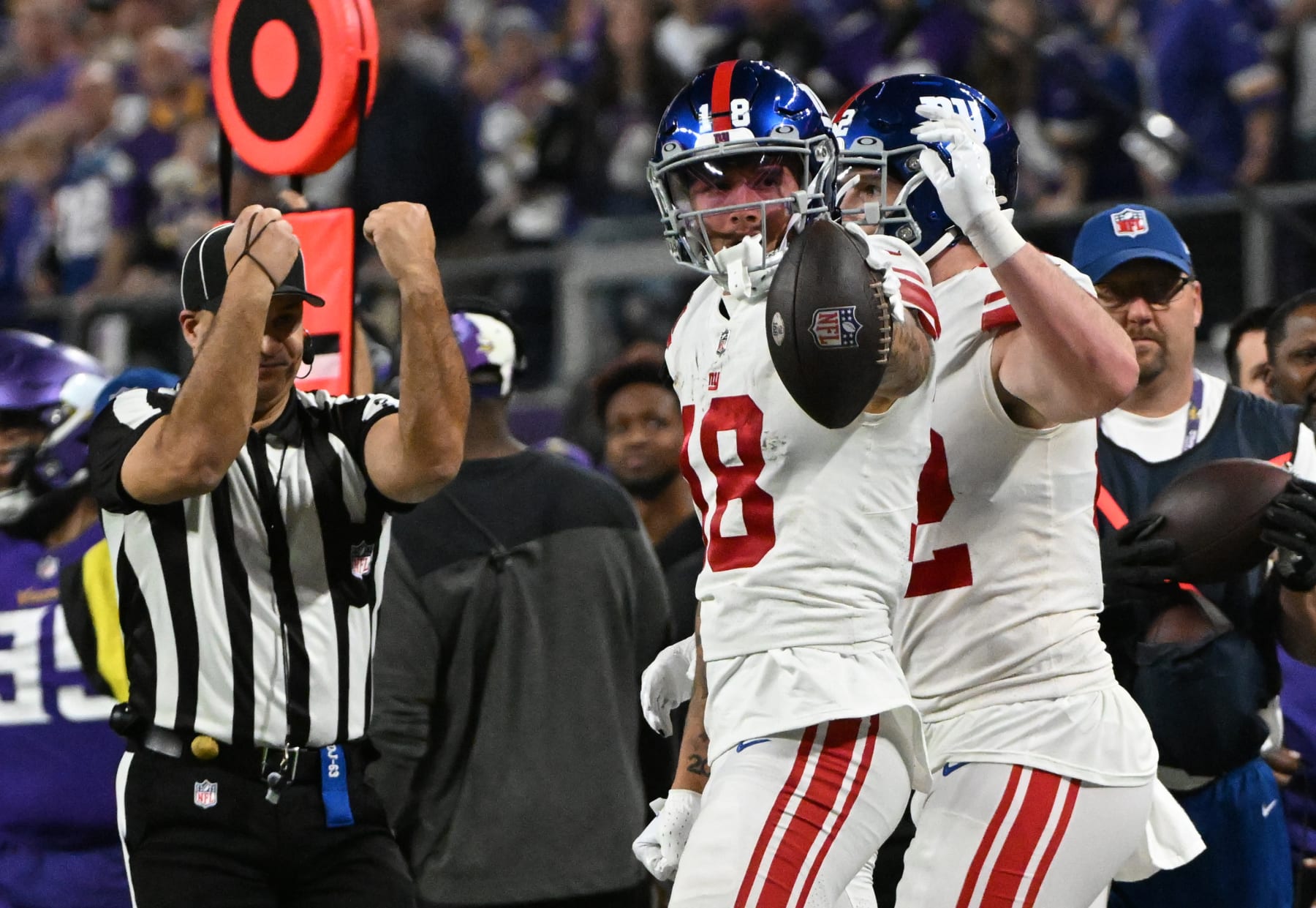 MINNEAPOLIS, MINNESOTA - JANUARY 15: Isaiah Hodgins #18 of the New York Giants reacts after catching a pass for a first down during the fourth quarter against the Minnesota Vikings in the NFC Wild Card playoff game at U.S. Bank Stadium on January 15, 2023 in Minneapolis, Minnesota. (Photo by Stephen Maturen/Getty Images)