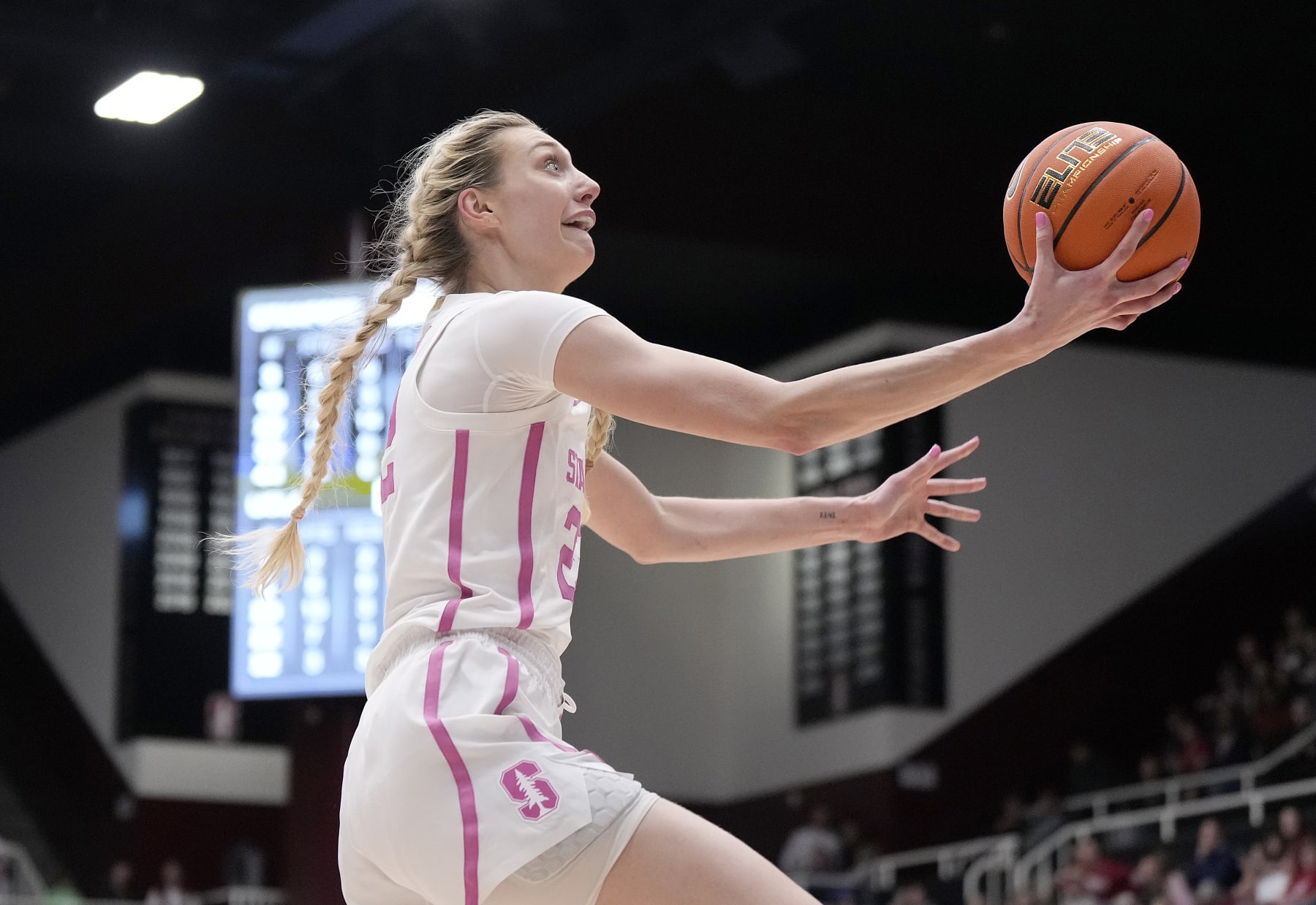 PALO ALTO, CALIFORNIA - FEBRUARY 04: Cameron Brink #22 of the Stanford Cardinal goes in for a layup on a fast break against the UCLA Bruins during the fourth quarter at Stanford Maples Pavilion on February 04, 2024 in Palo Alto, California. (Photo by Thearon W. Henderson/Getty Images)