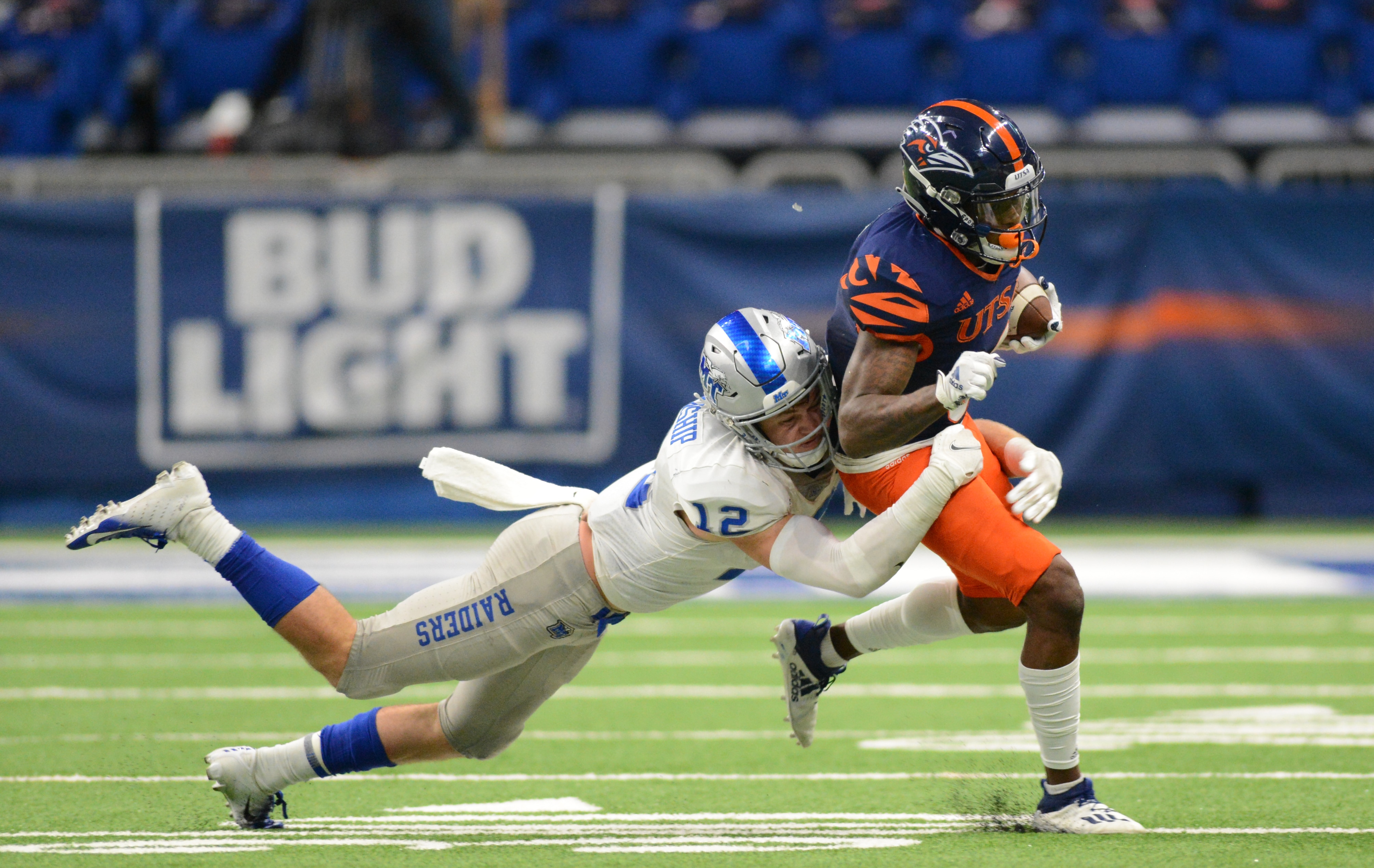 SAN ANTONIO, TX - SEPTEMBER 25: UT-San Antonio Roadrunners RB Brennon Dingle is tackled by Middle Tennessee Blue Raider DB Reed Blankenship (12) during game featuring the UT-San Antonio Roadrunners and the Middle Tennessee State Blue Raiders on September 26, 2020 at the Alamodome in San Antonio, Texas. (Photo by John Rivera/Icon Sportswire via Getty Images)