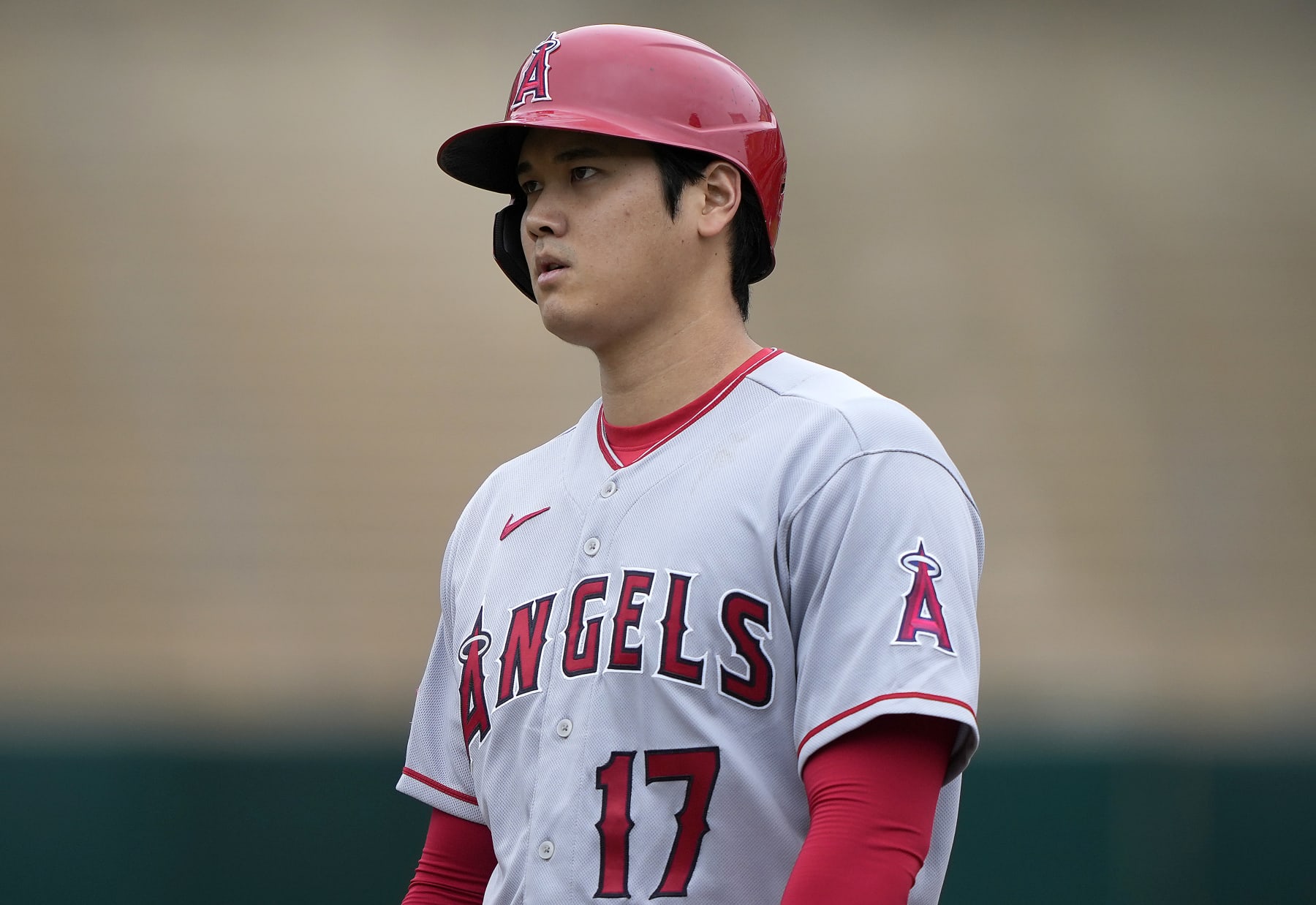 OAKLAND, CALIFORNIA - SEPTEMBER 02: Shohei Ohtani #17 of the Los Angeles Angels looks on while standing on first base after drawing a walk against the Oakland Athletics in the top of the first inning at RingCentral Coliseum on September 02, 2023 in Oakland, California. (Photo by Thearon W. Henderson/Getty Images)