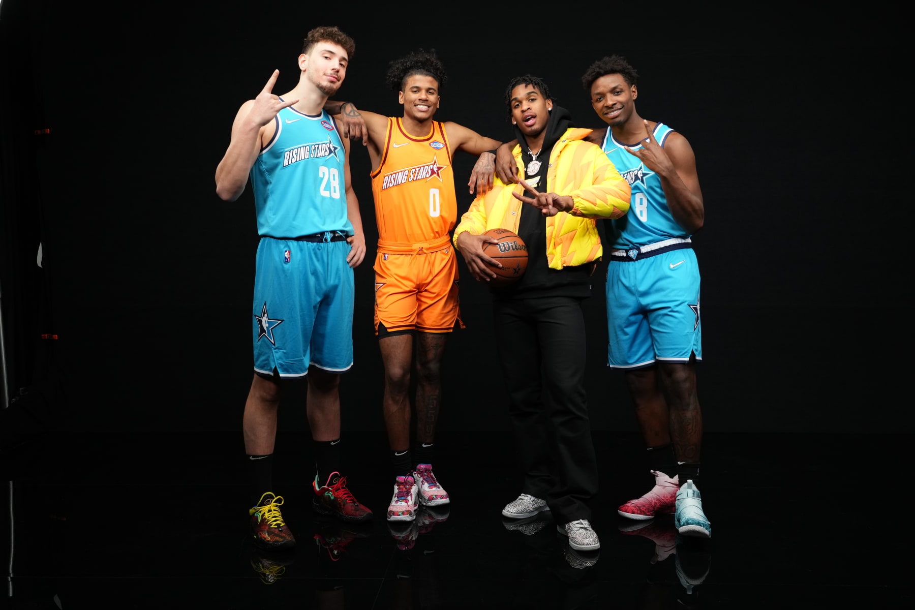 CLEVELAND, OH - FEBRUARY 18: Alperen Sengun #28 of Team Barry, Jalen Green #0 of Team Worthy, Josh Christopher #9 of the Houston Rockets and Jae'Sean Tate #8 of Team Barry pose for a photo as part of the Houston Rockets during the 2022 Clorox Rising Stars Game as part of 2022 NBA All Star Weekend on February 18, 2022 at Rocket Mortgage FieldHouse in Cleveland, Ohio. NOTE TO USER: User expressly acknowledges and agrees that, by downloading and/or using this Photograph, user is consenting to the terms and conditions of the Getty Images License Agreement. Mandatory Copyright Notice: Copyright 2022 NBAE (Photo by Jesse D. Garrabrant/NBAE via Getty Images)