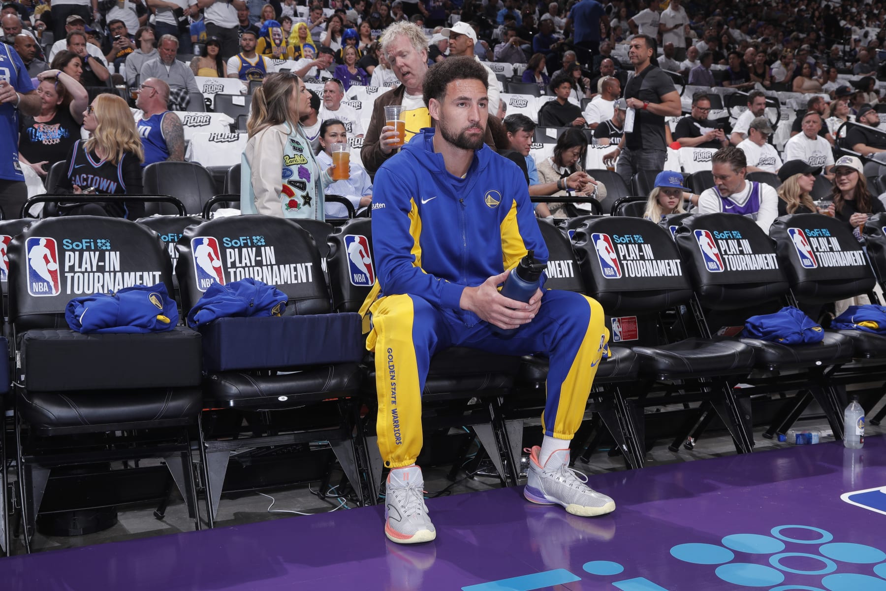 SACRAMENTO, CA - APRIL 16: Klay Thompson #11 of the Golden State Warriors looks on from the bench prior to the game against the Sacramento Kings during the 2024 Play-In Tournament on April 16, 2024 at Golden 1 Center in Sacramento, California. NOTE TO USER: User expressly acknowledges and agrees that, by downloading and or using this photograph, User is consenting to the terms and conditions of the Getty Images Agreement. Mandatory Copyright Notice: Copyright 2024 NBAE (Photo by Rocky Widner/NBAE via Getty Images)