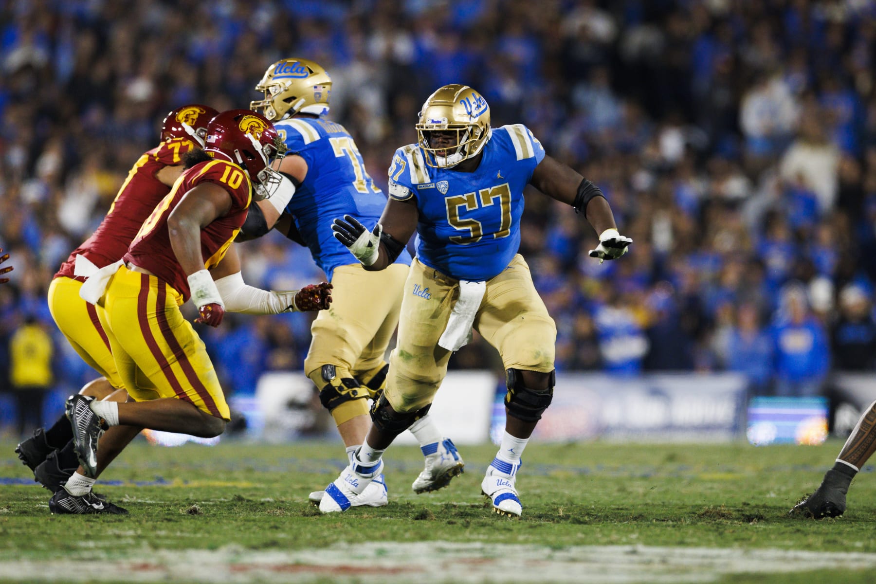 PASADENA, CA - NOVEMBER 19: UCLA Bruins offensive lineman Jon Gaines II (57) blocks during the college football game between the USC Trojans and the UCLA Bruins on November 19, 2022 at the Rose Bowl Stadium in Pasadena, CA. (Photo by Ric Tapia/Icon Sportswire via Getty Images)