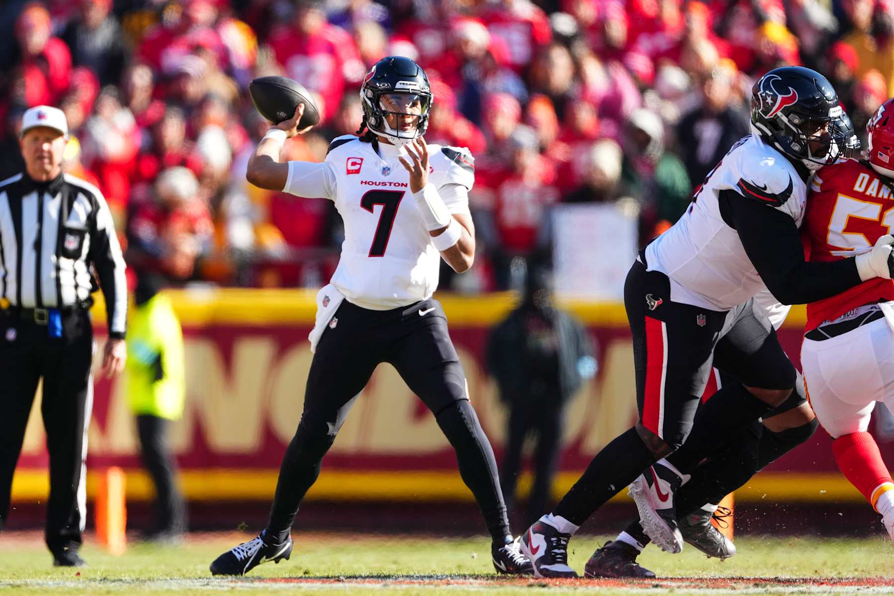 KANSAS CITY, MO - DECEMBER 21: C.J. Stroud #7 of the Houston Texans throws the ball during an NFL football game against the Kansas City Chiefs at GEHA Field at Arrowhead Stadium on December 21, 2024 in Kansas City, Missouri. (Photo by Cooper Neill/Getty Images)