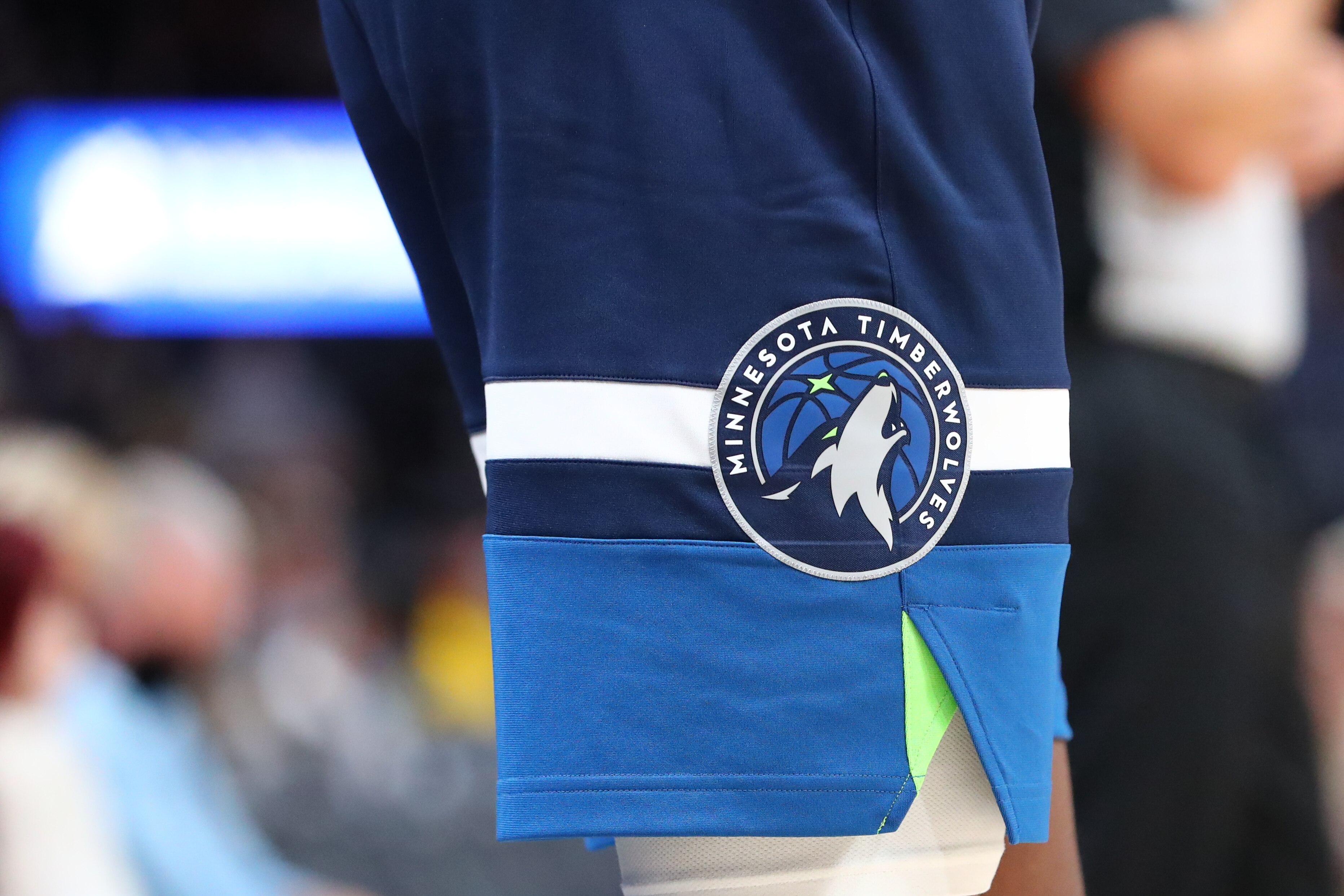 DENVER, CO - OCTOBER 08: The Minnesota Timberwolves logo is seen on the uniform of an unidentified player against the Denver Nuggets during the first quarter at Ball Arena on October 8, 2021 in Denver, Colorado. NOTE TO USER: User expressly acknowledges and agrees that, by downloading and or using this photograph, user is consenting to the terms and conditions of the Getty Images License Agreement.(Photo by C. Morgan Engel/Getty Images)