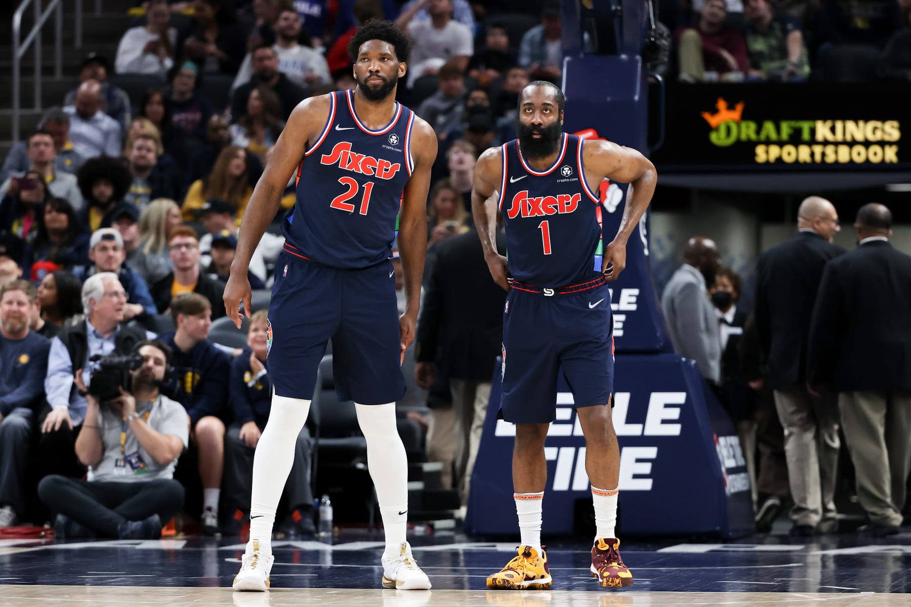 INDIANAPOLIS, INDIANA - APRIL 05: Joel Embiid #21 and James Harden #1 of the Philadelphia 76ers meet in the fourth quarter against the Indiana Pacers at Gainbridge Fieldhouse on April 05, 2022 in Indianapolis, Indiana. NOTE TO USER: User expressly acknowledges and agrees that, by downloading and or using this Photograph, user is consenting to the terms and conditions of the Getty Images License Agreement. (Photo by Dylan Buell/Getty Images)
