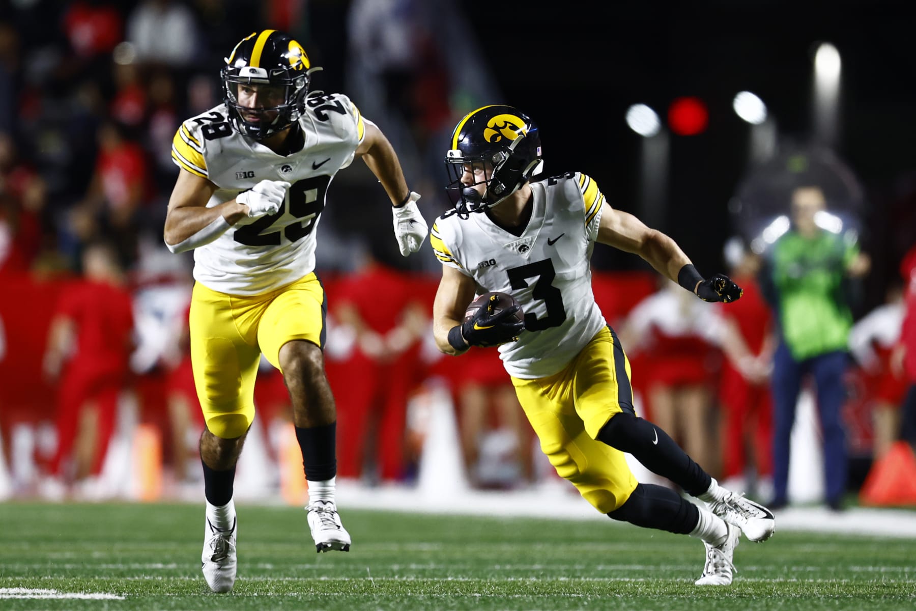 PISCATAWAY, NJ - SEPTEMBER 24: Defensive back Cooper DeJean #3 of the Iowa Hawkeyes intercepts a pass and returns for a touchdown against the Rutgers Scarlet Knights  during the first quarter of a game at SHI Stadium on September 24, 2022 in Piscataway, New Jersey. (Photo by Rich Schultz/Getty Images)