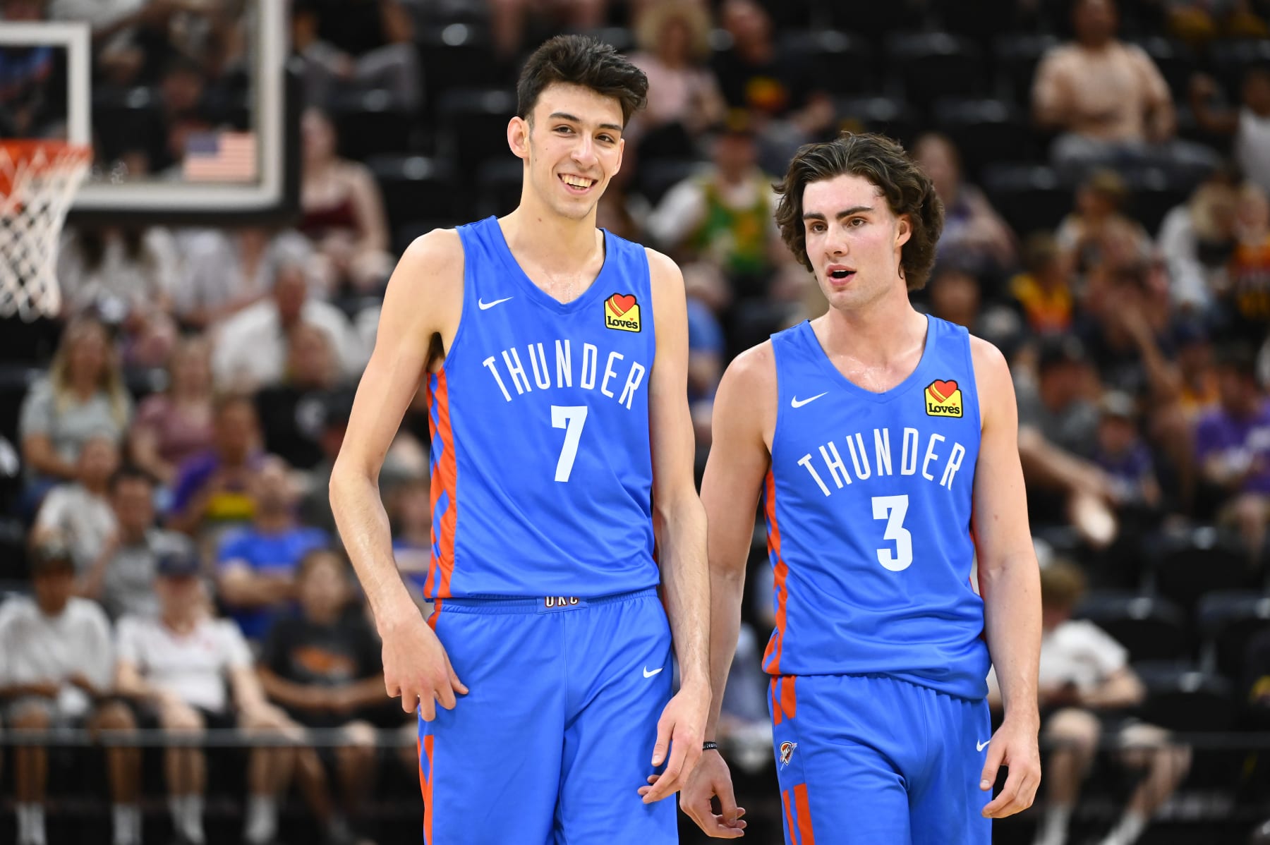 SALT LAKE CITY, UTAH - JULY 05: Chet Holmgren #7 of the Oklahoma City Thunder speaks with teammate Josh Giddey #3 during a NBA Summer League game against the Utah Jazz at Vivint Arena on July 05, 2022 in Salt Lake City, Utah. NOTE TO USER: User expressly acknowledges and agrees that, by downloading and/or using this Photograph, user is consenting to the terms and conditions of the Getty Images License Agreement. (Photo by Alex Goodlett/Getty Images)