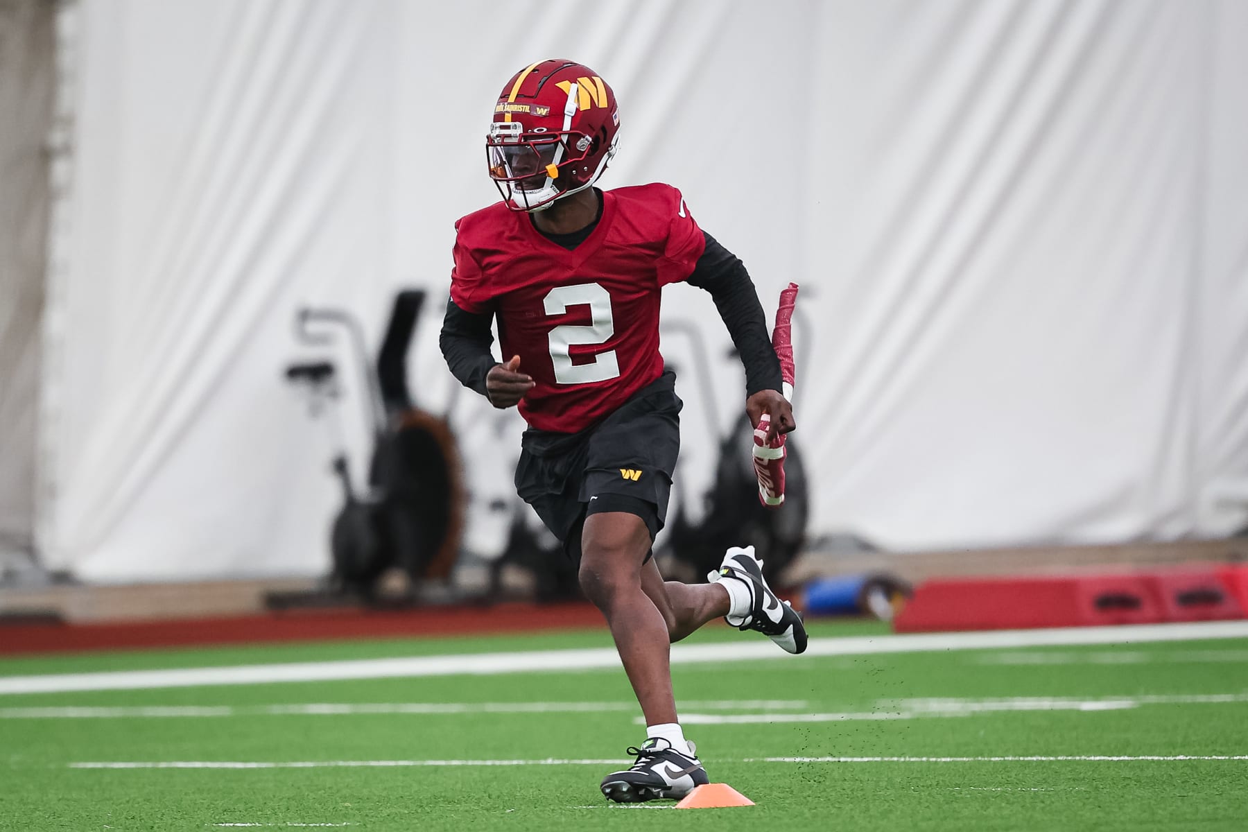 ASHBURN, VA - MAY 10: Mike Sainristil #2 of the Washington Commanders participates in a drill during Washington Commanders Rookie Minicamp at OrthoVirginia Training Center on May 10, 2024 in Ashburn, Virginia. (Photo by Scott Taetsch/Getty Images)