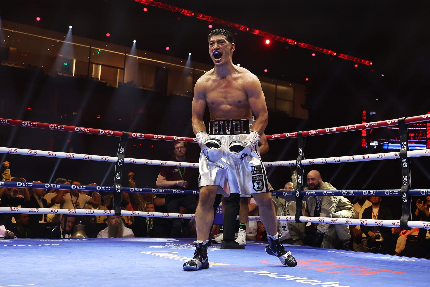 RIYADH, SAUDI ARABIA - JUNE 01: Dmitrii Bivol celebrates after Referee Howard Foster stops the fight during the IBO World and WBA Super World Light Heavyweight Titles fight between Dmitrii Bivol and Malik Zinad on the 5v5: Queensberry v Matchroom Fight Night card at Kingdom Arena on June 01, 2024 in Riyadh, Saudi Arabia. (Photo by Richard Pelham/Getty Images)