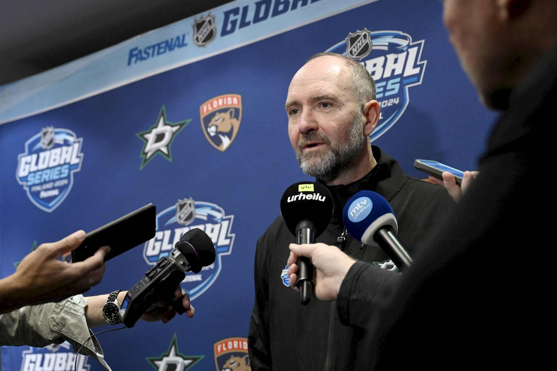 Dallas Stars' Canadian head coach Peter DeBoer speaks with journalists during a press meeting in Helsinki, Finland, on October 28, 2024. NHL teams Dallas Stars and Florida Panthers will face each other in NHL Global Series matches in Tampere on upcoming on November 1 and November 2. (Photo by Emmi Korhonen / Lehtikuva / AFP) / Finland OUT (Photo by EMMI KORHONEN/Lehtikuva/AFP via Getty Images)