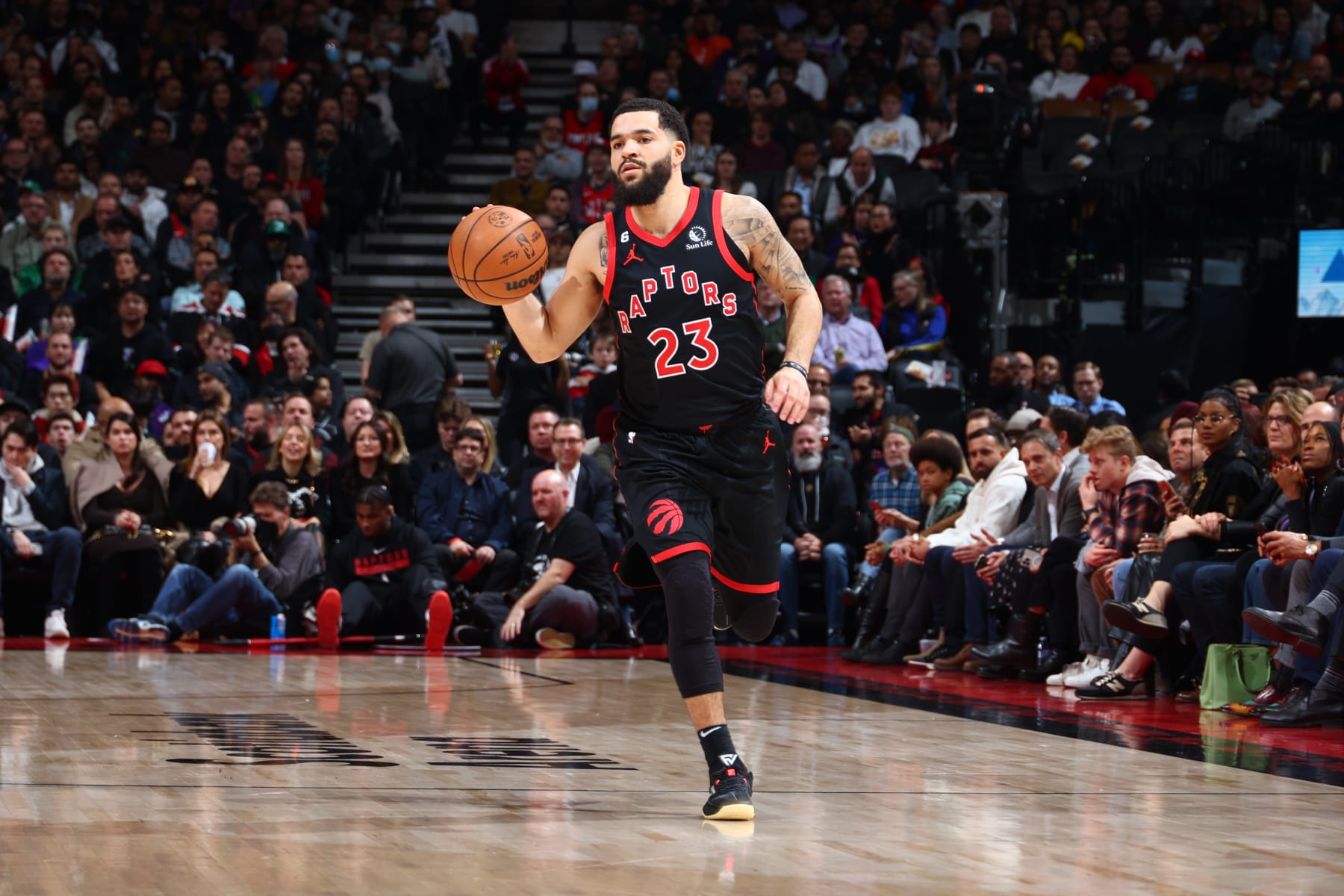 TORONTO, CANADA - DECEMBER 5: Fred VanVleet #23 of the Toronto Raptors dribbles the ball during the game against the Boston Celtics on December 5, 2022 at the Scotiabank Arena in Toronto, Ontario, Canada.  NOTE TO USER: User expressly acknowledges and agrees that, by downloading and or using this Photograph, user is consenting to the terms and conditions of the Getty Images License Agreement.  Mandatory Copyright Notice: Copyright 2022 NBAE (Photo by Vaughn Ridley/NBAE via Getty Images)