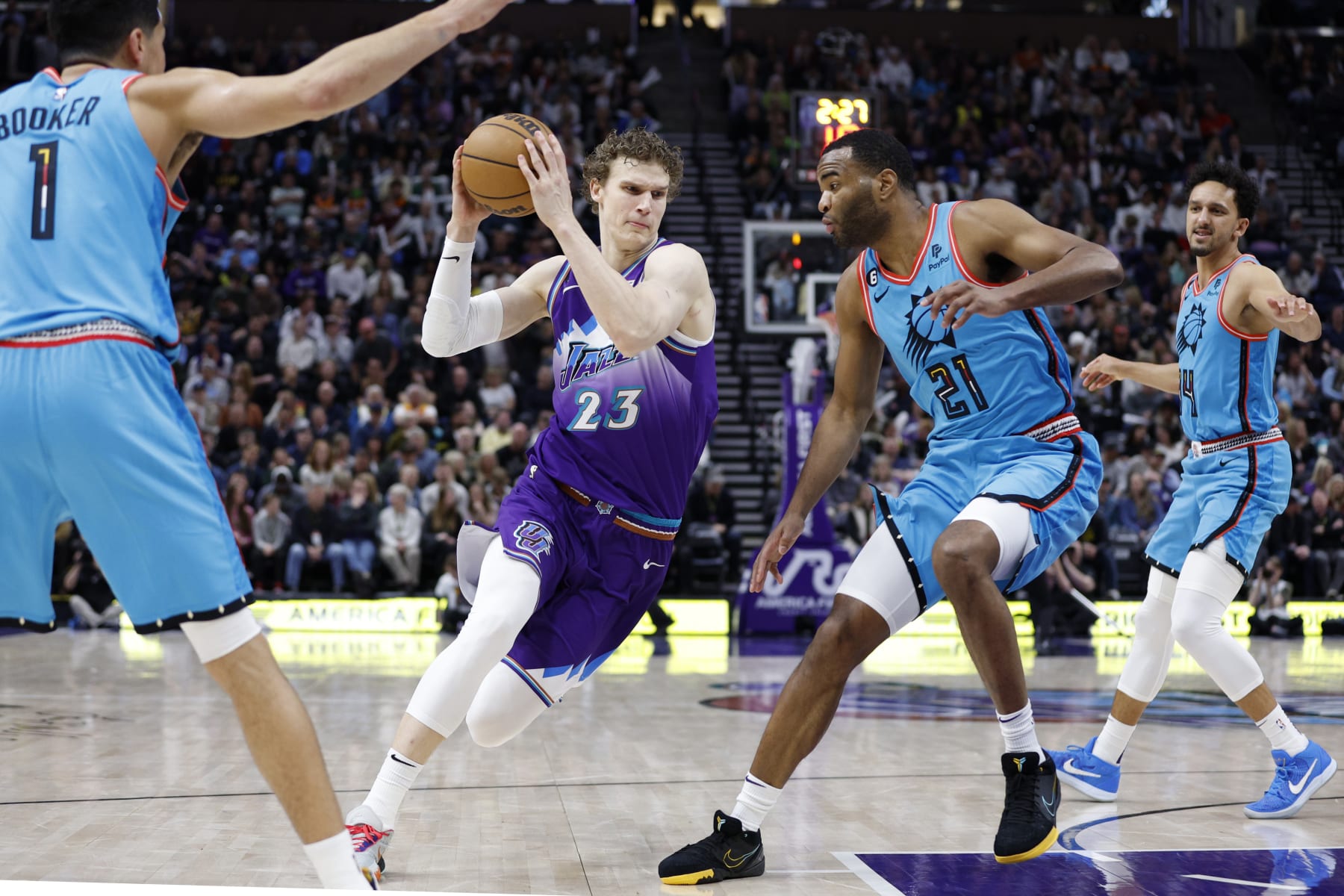 SALT LAKE CITY, UT - MARCH 27: Lauri Markkanen #23 of the Utah Jazz drives to the basket against the Phoenix Suns on March 27. 2023 at vivint.SmartHome Arena in Salt Lake City, Utah. NOTE TO USER: User expressly acknowledges and agrees that, by downloading and or using this Photograph, User is consenting to the terms and conditions of the Getty Images License Agreement. Mandatory Copyright Notice: Copyright 2023 NBAE (Photo by Jeff Swinger/NBAE via Getty Images)