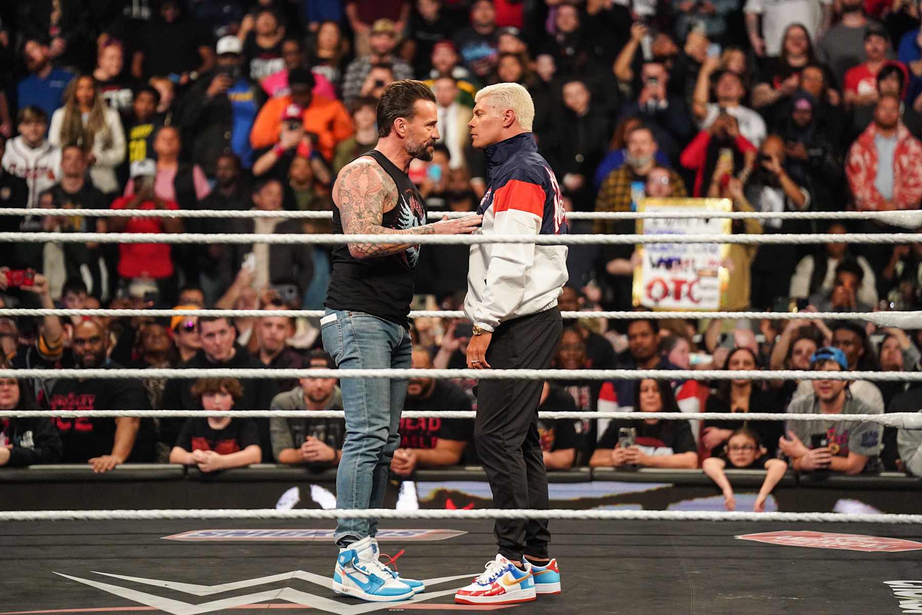 ATLANTA, GEORGIA - JANUARY 27: CM Punk and Cody Rhodes speak during WWE Monday Night RAW at State Farm Arena on January 27, 2025 in Atlanta, Georgia. (Photo by WWE/Getty Images)