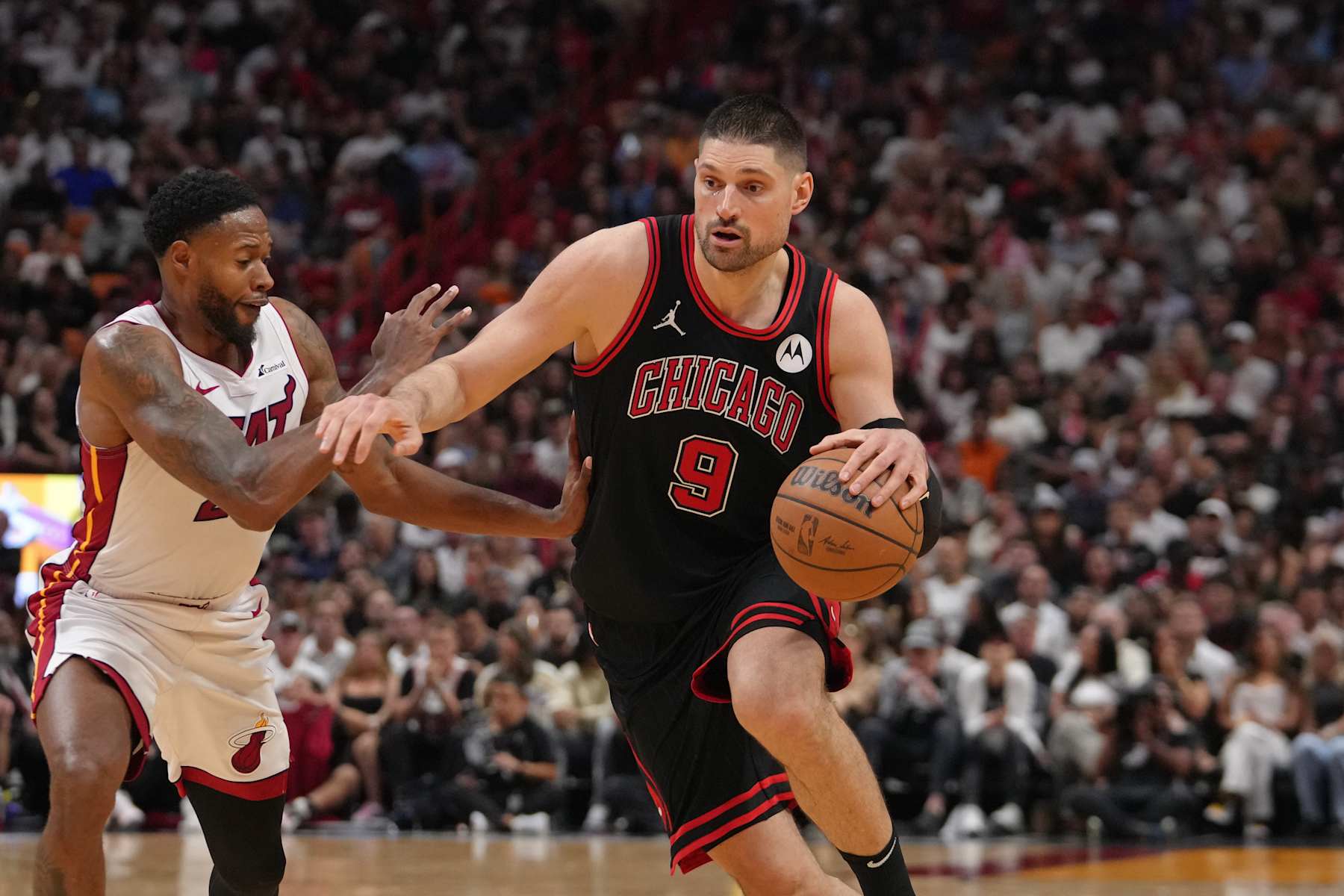 MIAMI, FL - APRIL 19: Nikola Vucevic #9 of the Chicago Bulls drives to the basket during the game against the Miami Heat during the 2024 SoFi Play-In Tournament on April 19, 2024 at Kaseya Center in Miami, Florida. NOTE TO USER: User expressly acknowledges and agrees that, by downloading and or using this Photograph, user is consenting to the terms and conditions of the Getty Images License Agreement. Mandatory Copyright Notice: Copyright 2024 NBAE (Photo by Eric Espada/NBAE via Getty Images)