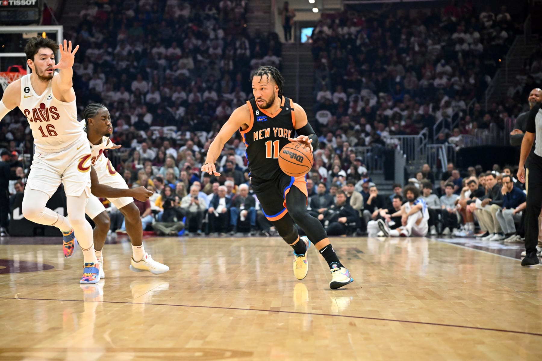 CLEVELAND, OHIO - APRIL 18: Jalen Brunson #11 of the New York Knicks brings the ball up court during the first quarter of Game Two of the Eastern Conference First Round Playoffs against the Cleveland Cavaliers at Rocket Mortgage Fieldhouse on April 18, 2023 in Cleveland, Ohio. NOTE TO USER: User expressly acknowledges and agrees that, by downloading and or using this photograph, User is consenting to the terms and conditions of the Getty Images License Agreement. (Photo by Jason Miller/Getty Images)