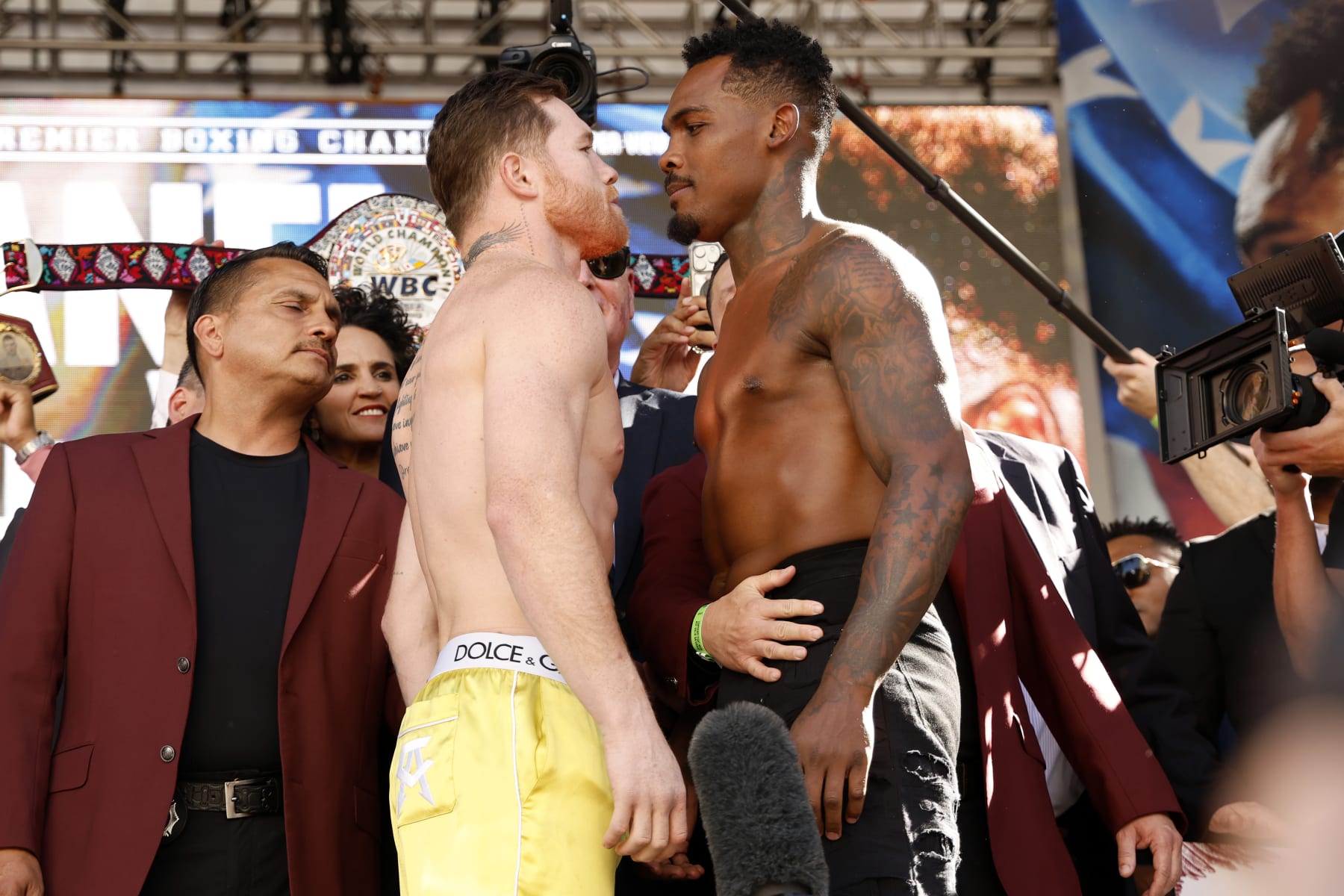 LAS VEGAS, NEVADA - SEPTEMBER 29: Undisputed super middleweight champion Saul “Canelo” Alvarez of Mexico (L) and Jermell Charlo face off during their weigh-in at Toshiba Plaza on September 29, 2023 in Las Vegas, Nevada. Alvarez will defend his titles against Charlo at T-Mobile Arena on September 30 in Las Vegas. (Photo by Sarah Stier/Getty Images)