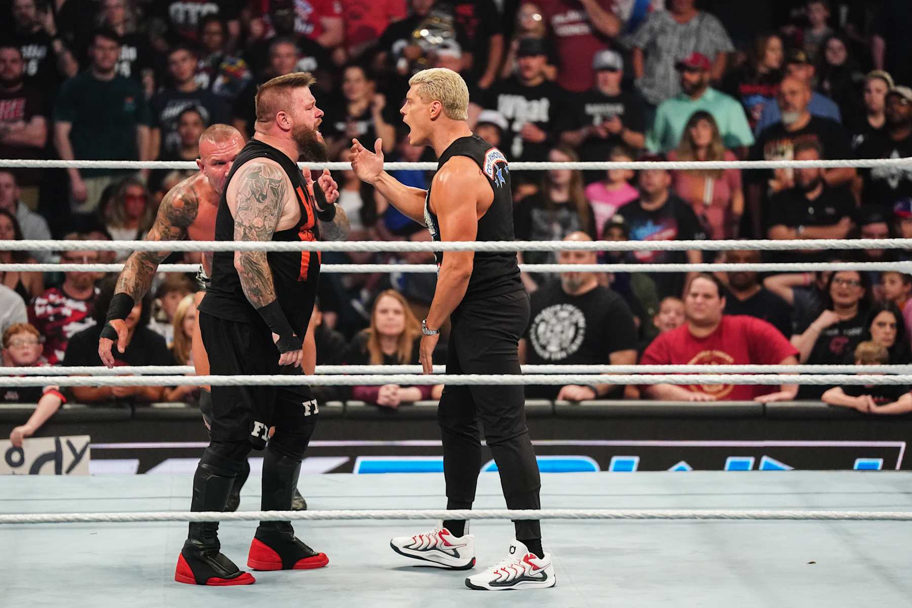 OKLAHOMA CITY, OKLAHOMA - SEPTEMBER 27: Kevin Owens and Cody Rhodes in ring during WWE SmackDown at Paycom Center on September 27, 2024 in Oklahoma City, Oklahoma.  (Photo by WWE/Getty Images)