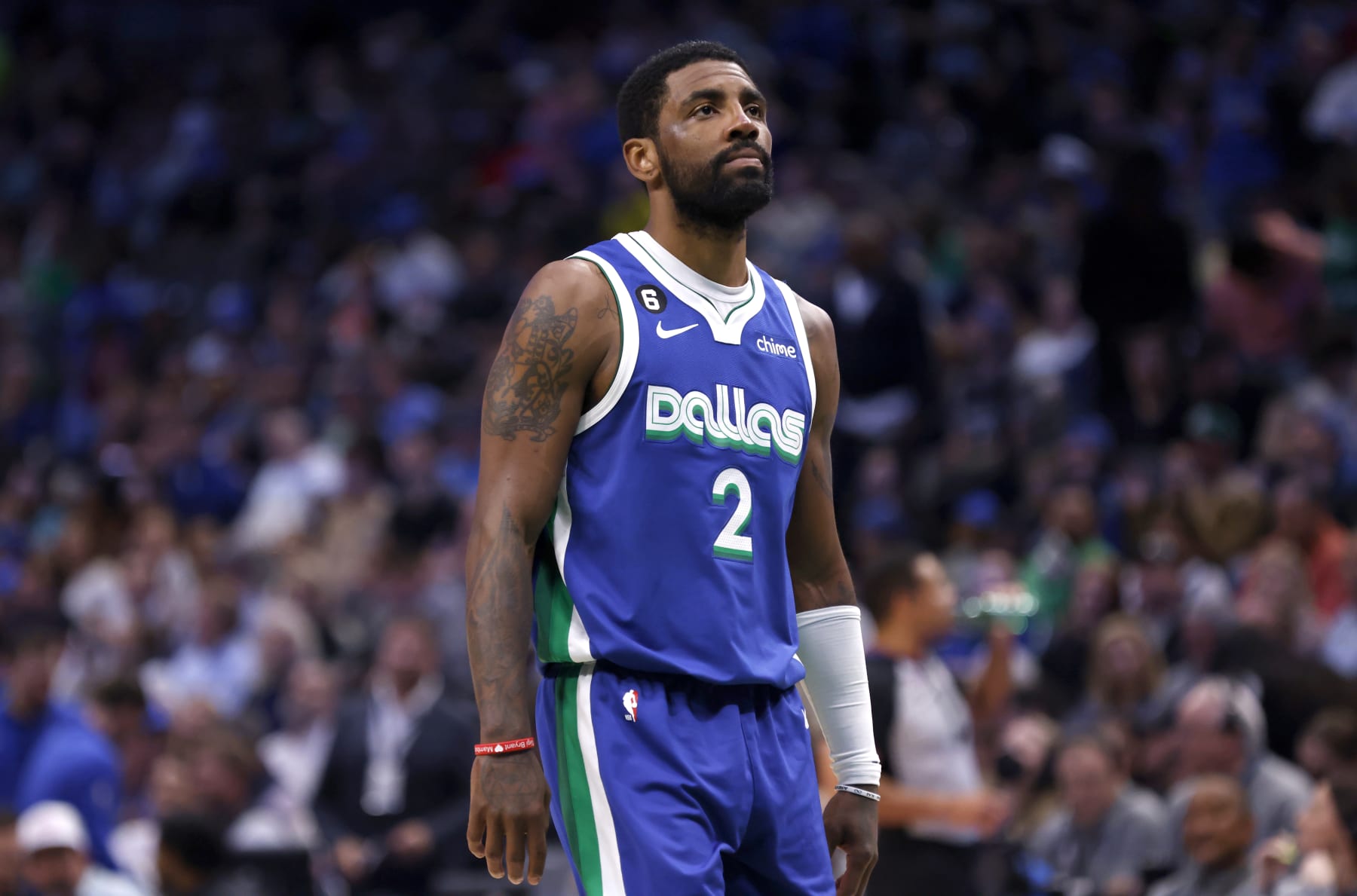 DALLAS, TX - APRIL 5: Kyrie Irving #2 of the Dallas Mavericks looks on as the Mavericks play the Sacramento Kings in the first half at American Airlines Center on April 5, 2023 in Dallas, Texas. NOTE TO USER: User expressly acknowledges and agrees that, by downloading and or using this photograph, User is consenting to the terms and conditions of the Getty Images License Agreement. (Photo by Ron Jenkins/Getty Images)