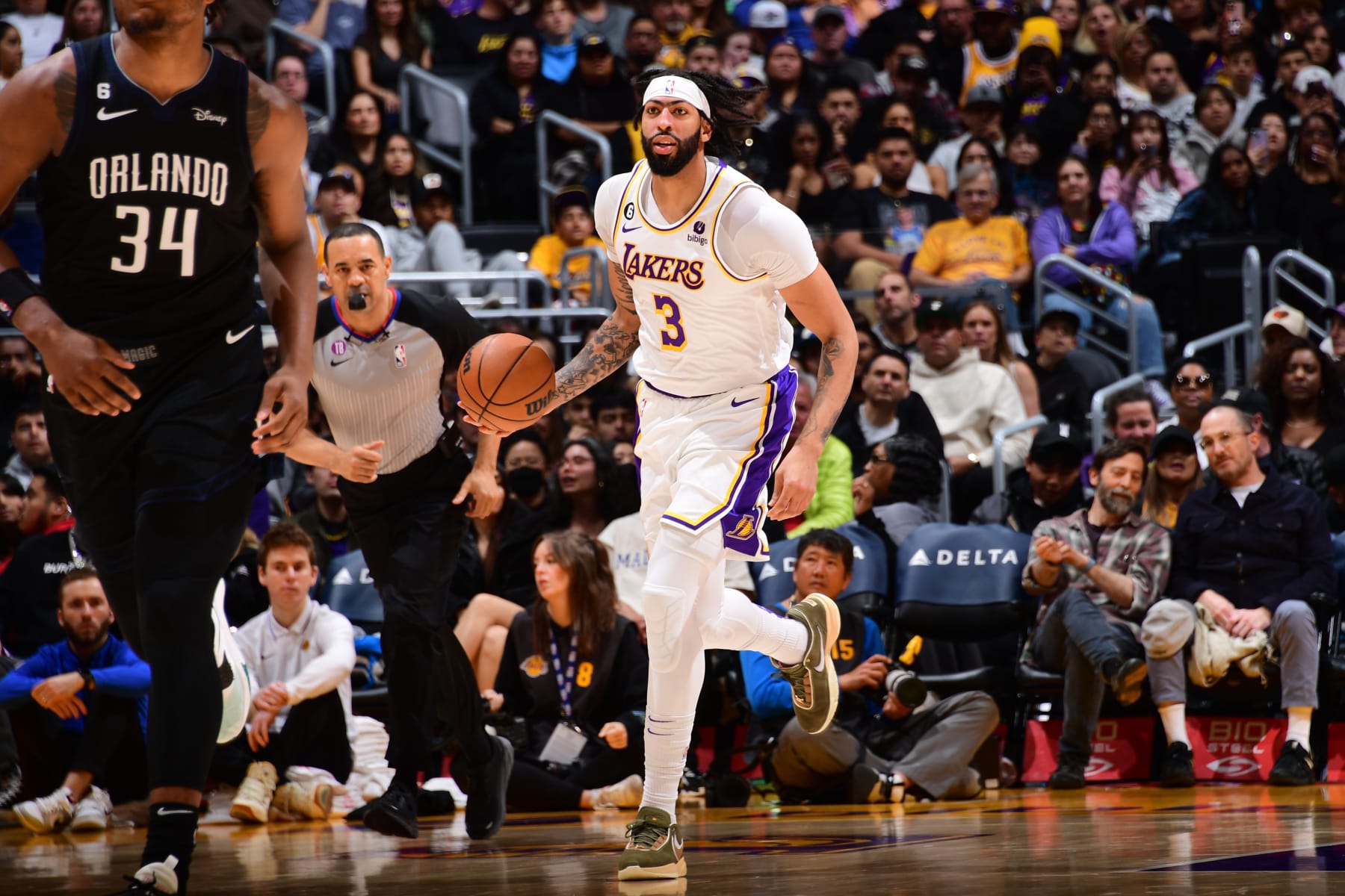 LOS ANGELES, CA - MARCH 19: Anthony Davis #3 of the Los Angeles Lakers dribbles the ball during the game against the Orlando Magic on March 19, 2023 at Crypto.Com Arena in Los Angeles, California. NOTE TO USER: User expressly acknowledges and agrees that, by downloading and/or using this Photograph, user is consenting to the terms and conditions of the Getty Images License Agreement. Mandatory Copyright Notice: Copyright 2023 NBAE (Photo by Adam Pantozzi/NBAE via Getty Images)