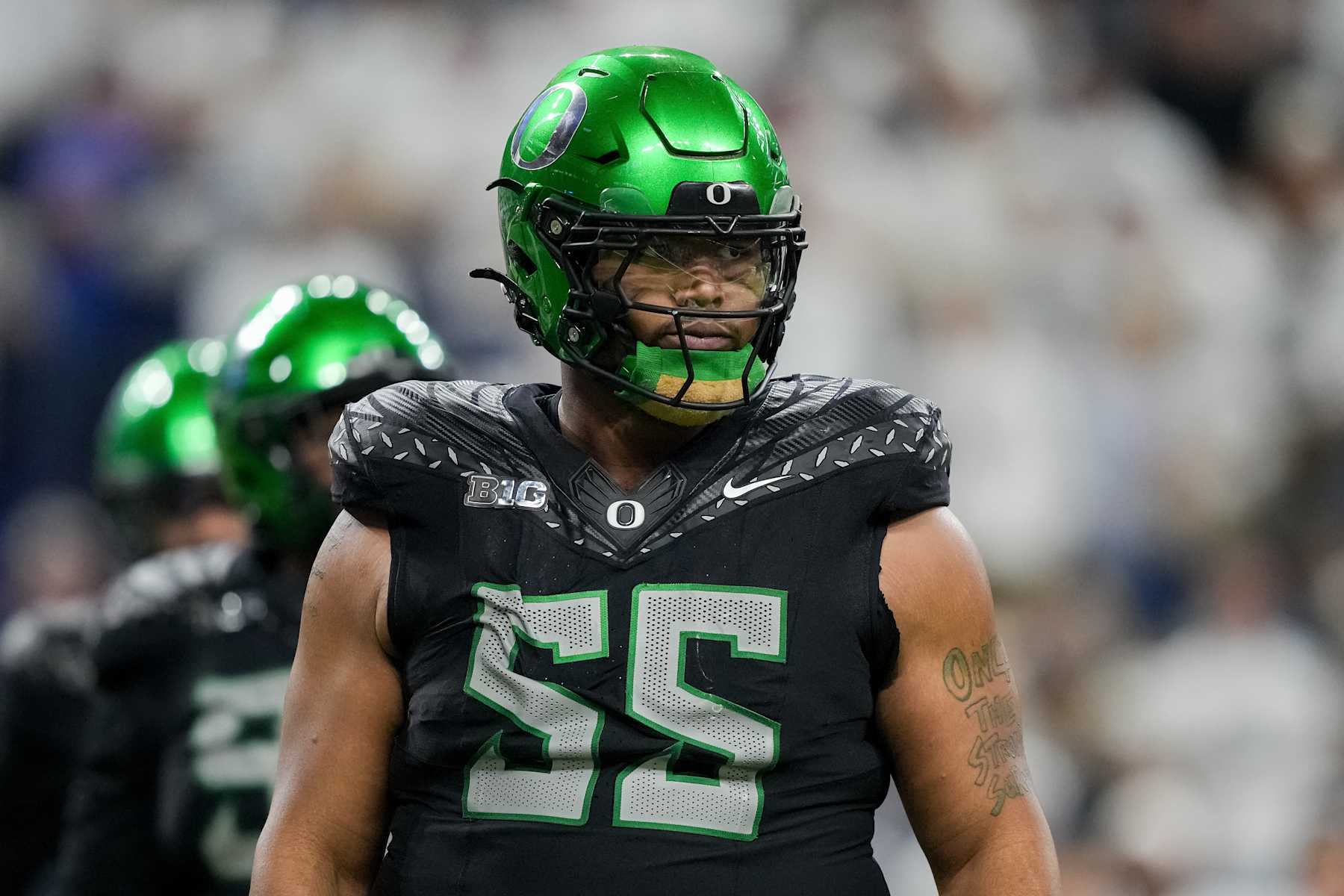 INDIANAPOLIS, INDIANA - DECEMBER 07: Derrick Harmon #55 of the Oregon Ducks looks to the sideline in the second quarter against the Penn State Nittany Lions of the 2024 Big Ten Football Championship at Lucas Oil Stadium on December 07, 2024 in Indianapolis, Indiana. (Photo by Dylan Buell/Getty Images)