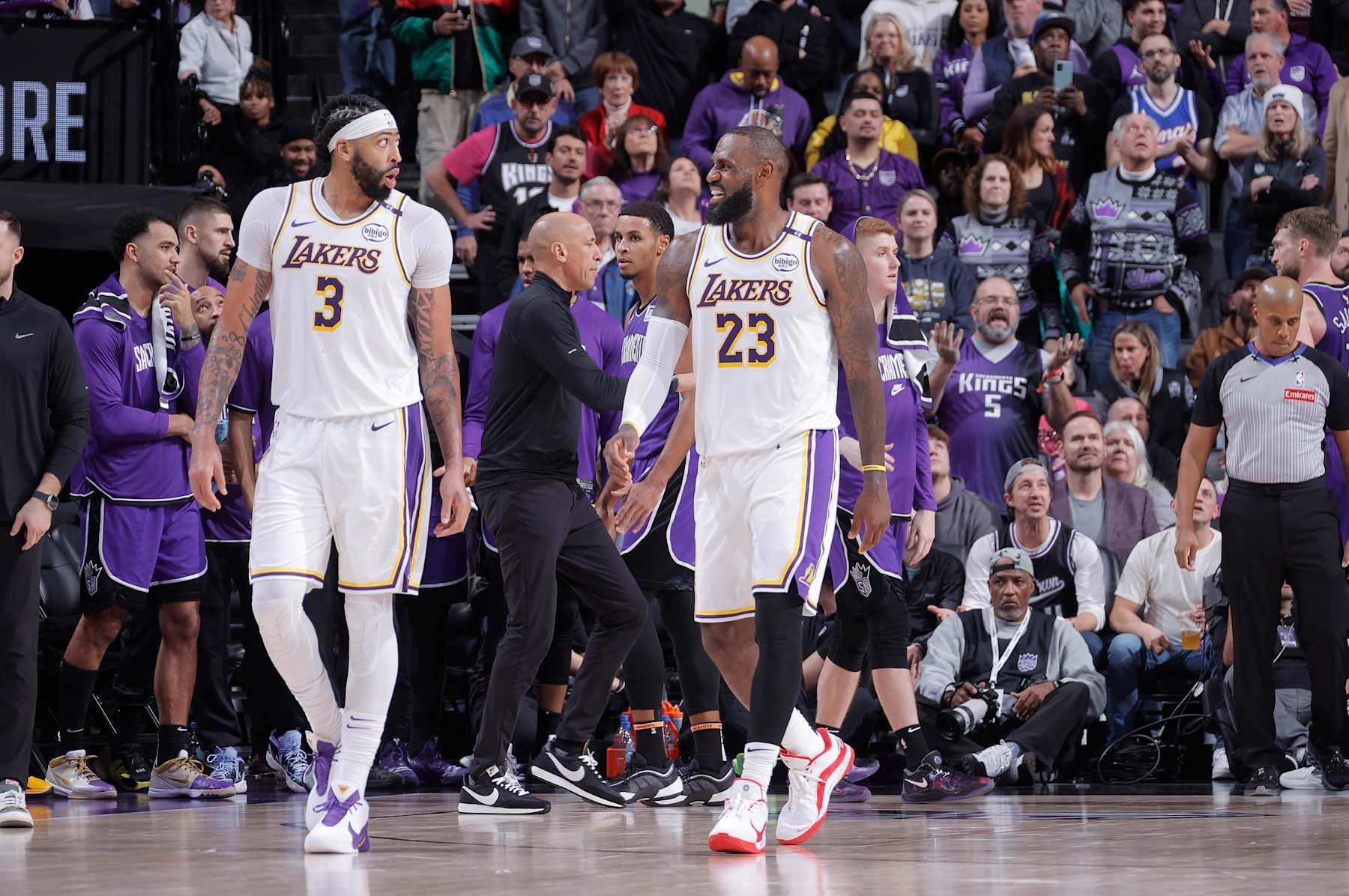 SACRAMENTO, CA - DECEMBER 21: Anthony Davis #3 and LeBron James #23 of the Los Angeles Lakers talk during the game against the Sacramento Kings on December 21, 2024 at Golden 1 Center in Sacramento, California. NOTE TO USER: User expressly acknowledges and agrees that, by downloading and or using this photograph, User is consenting to the terms and conditions of the Getty Images Agreement. Mandatory Copyright Notice: Copyright 2024 NBAE (Photo by Rocky Widner/NBAE via Getty Images)