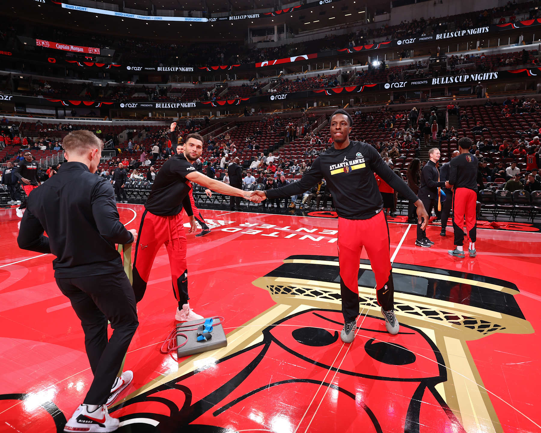 CHICAGO, IL - NOVEMBER 22: Zach LaVine #8 of the Chicago Bulls and Onyeka Okongwu #17 of the Atlanta Hawks shake hands before the game during the Emirates NBA Cup game on November 22, 2024 at United Center in Chicago, Illinois. NOTE TO USER: User expressly acknowledges and agrees that, by downloading and or using this photograph, User is consenting to the terms and conditions of the Getty Images License Agreement. Mandatory Copyright Notice: Copyright 2024 NBAE (Photo by Jeff Haynes/NBAE via Getty Images)