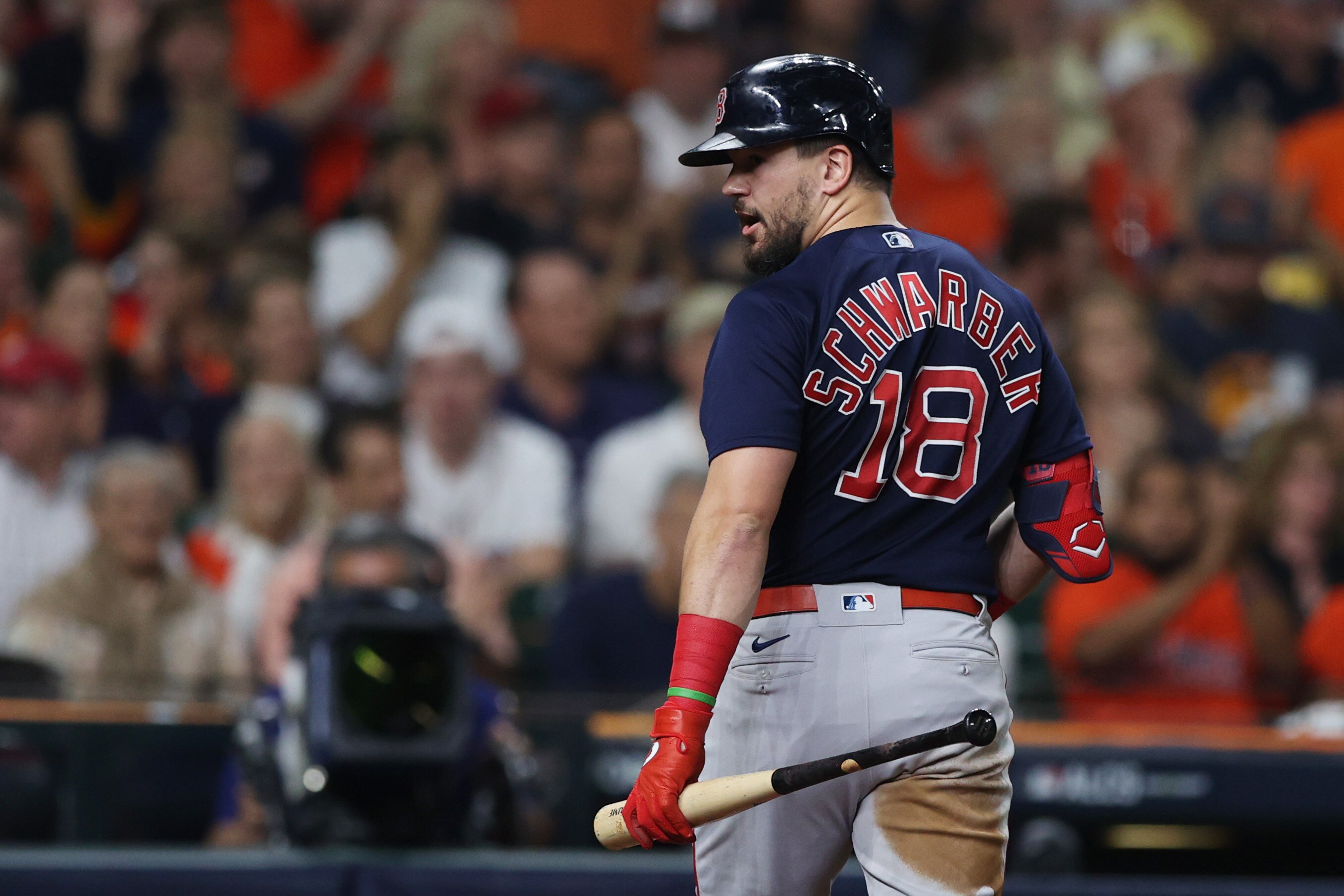 HOUSTON, TEXAS - OCTOBER 22: Kyle Schwarber #18 of the Boston Red Sox reacts after striking out against the Houston Astros during the third inning in Game Six of the American League Championship Series at Minute Maid Park on October 22, 2021 in Houston, Texas. (Photo by Elsa/Getty Images)