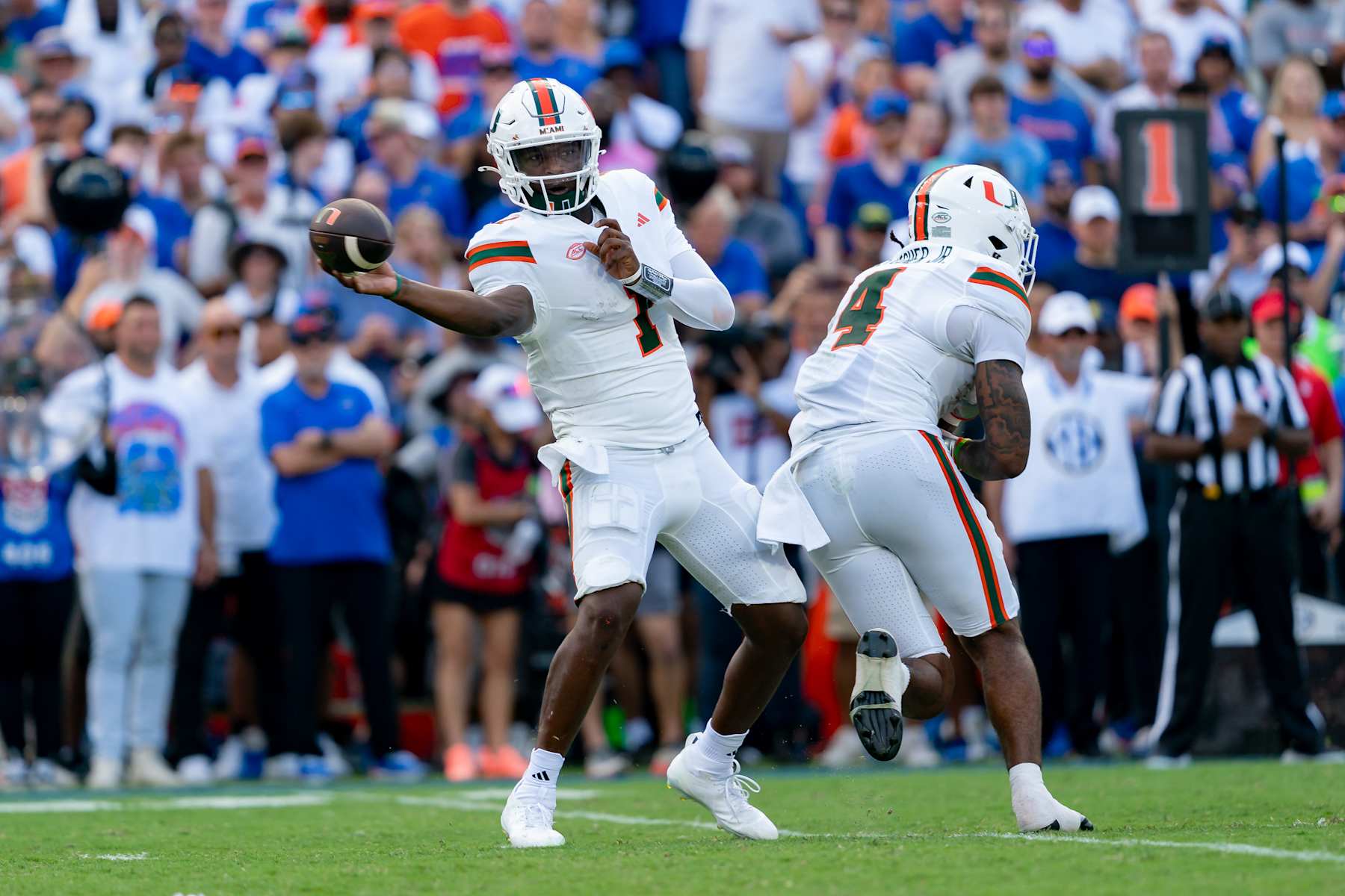 GAINESVILLE, FL - AUGUST 31:Miami Hurricanes quarterback Cam Ward (1) throws a quick pass during a college football game between the Miami Hurricanes and the Florida Gators on August 17, 2024 at Ben Hill Griffin Stadium in Gainesville, FL. (Photo by Chris Leduc/Icon Sportswire via Getty Images)