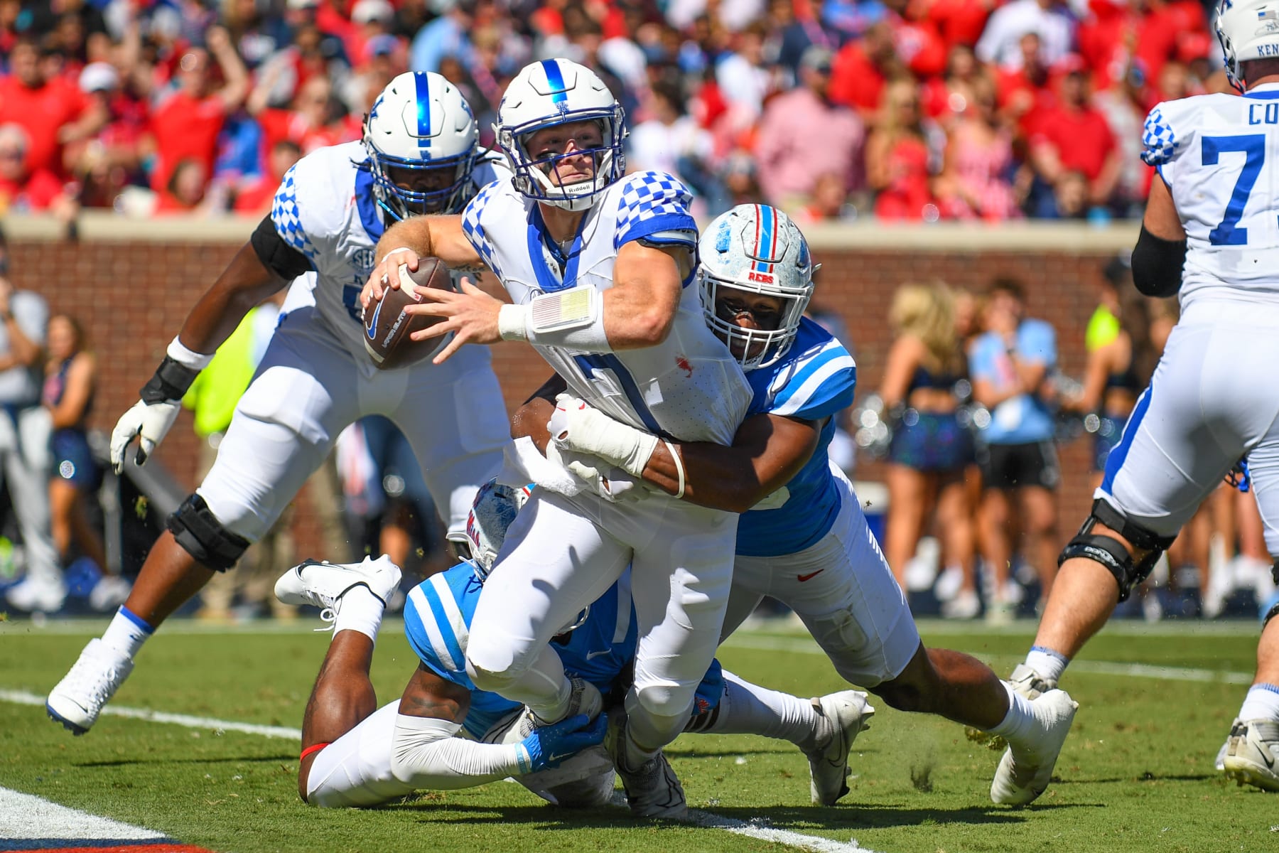 OXFORD, MS - OCTOBER 01: Kentucky quarterback Will Levis (7) is brought down by Ole' Miss defensive end Tavius Robinson (95) during the college football game between the Kentucky Wildcats and the Ole' Miss Rebels at Vaught-Hemingway Stadium in Oxford, MS. (Photo by Kevin Langley/Icon Sportswire via Getty Images)