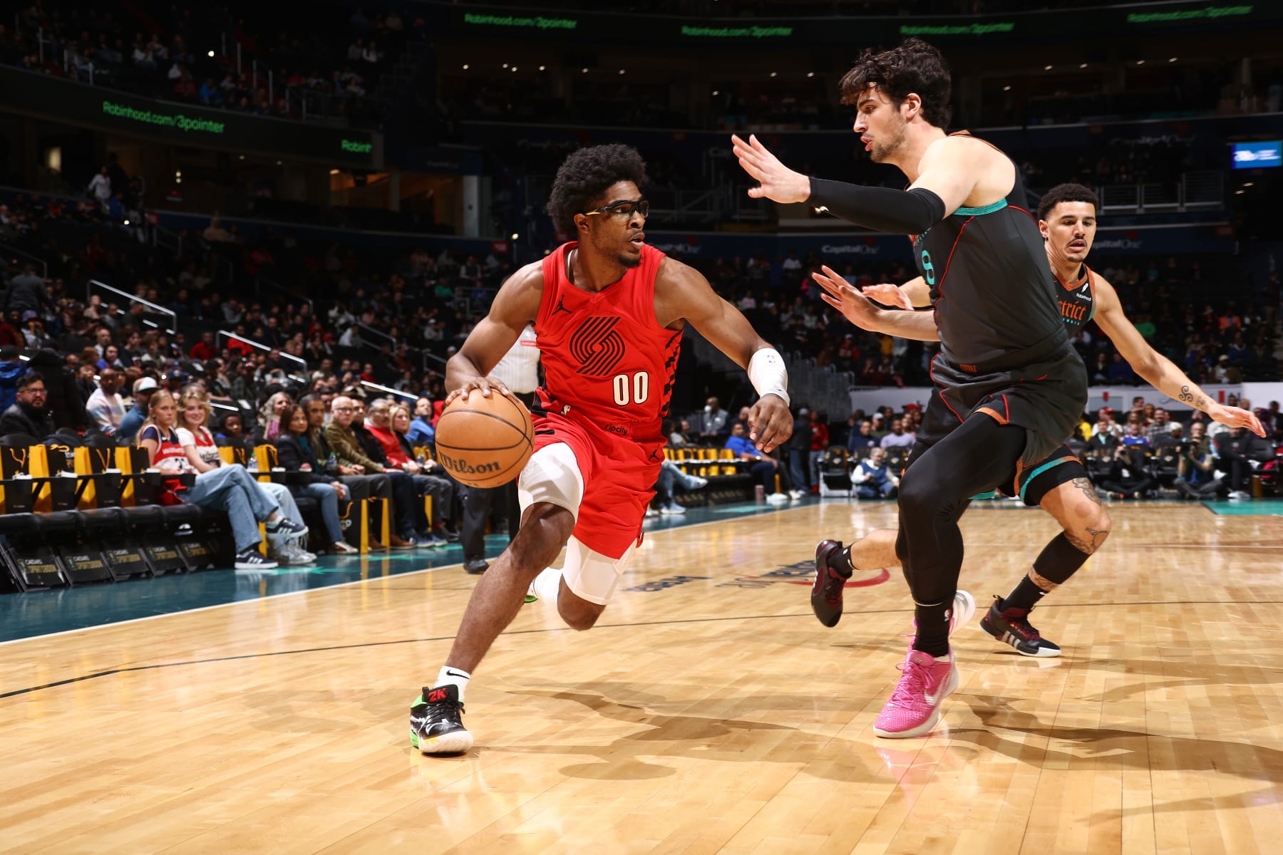 WASHINGTON, DC -  APRIL 5: Scoot Henderson #00 of the Portland Trail Blazers dribbles the ball during the game against the Washington Wizards on April 5, 2024 at Capital One Arena in Washington, DC. NOTE TO USER: User expressly acknowledges and agrees that, by downloading and or using this Photograph, user is consenting to the terms and conditions of the Getty Images License Agreement. Mandatory Copyright Notice: Copyright 2024 NBAE (Photo by Kenny Giarla/NBAE via Getty Images)