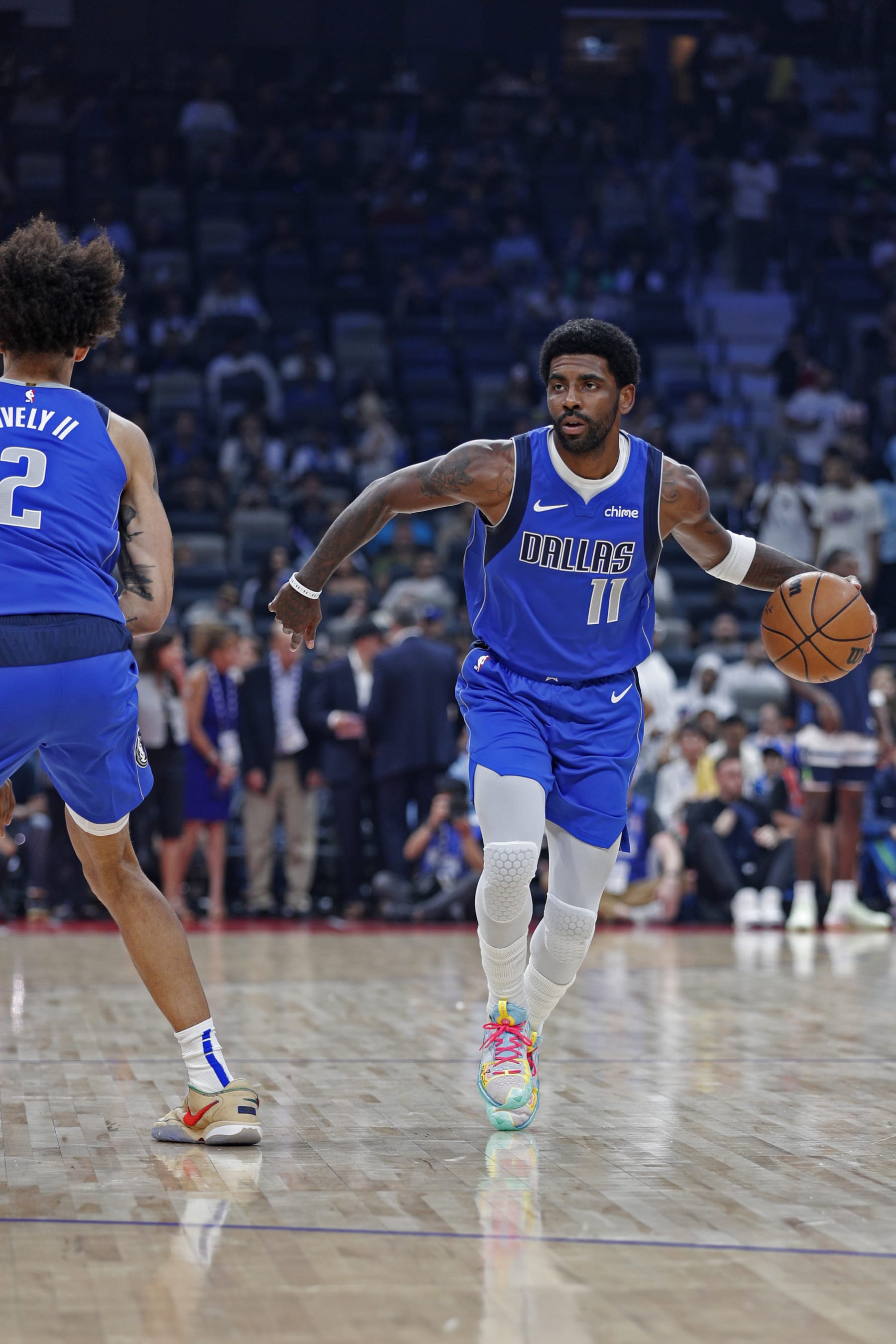 ABU DHABI, UAE - OCTOBER 5: Kyrie Irving #11 of the Dallas Mavericks dribbles the ball against the Minnesota Timberwolves as part of 2023 NBA Global Games Abu Dhabi at Etihad Arena on October 5, 2023 in Abu Dhabi, The United Arab Emirates. NOTE TO USER: User expressly acknowledges and agrees that, by downloading and/or using this Photograph, user is consenting to the terms and conditions of the Getty Images License Agreement. Mandatory Copyright Notice: Copyright 2023 NBAE (Photo by Chris Marion/NBAE via Getty Images)