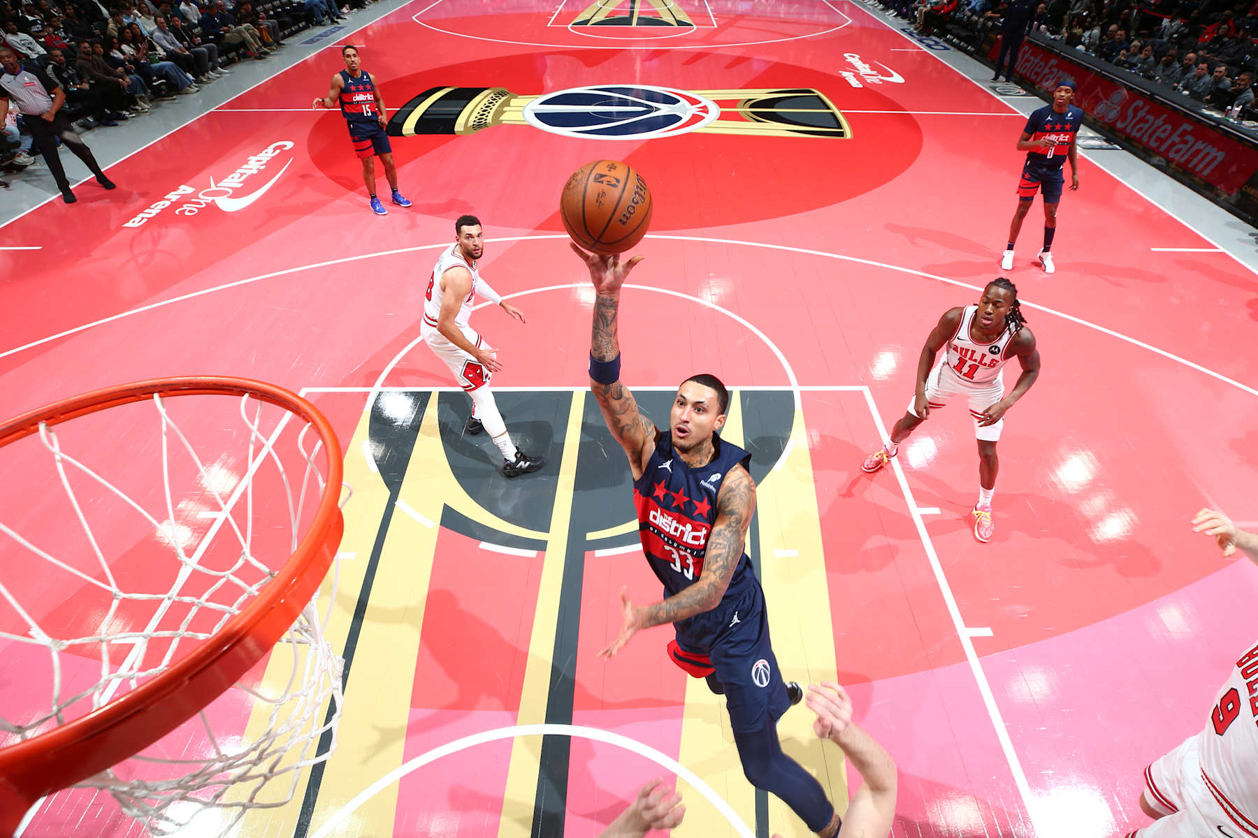WASHINGTON, DC -  NOVEMBER 26: Kyle Kuzma #33 of the Washington Wizards drives to the basket during the game against the Chicago Bulls during the Emirates NBA Cup game on November 26, 2024 at Capital One Arena in Washington, DC. NOTE TO USER: User expressly acknowledges and agrees that, by downloading and or using this Photograph, user is consenting to the terms and conditions of the Getty Images License Agreement. Mandatory Copyright Notice: Copyright 2024 NBAE (Photo by Stephen Gosling/NBAE via Getty Images)