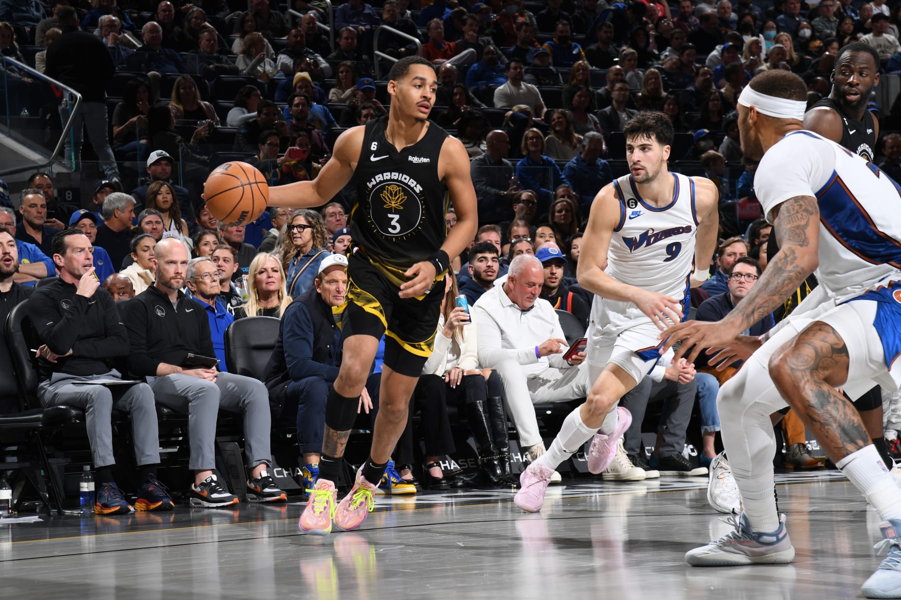 SAN FRANCISCO, CA - FEBRUARY 13: Jordan Poole #3 of the Golden State Warriors dribbles the ball during the game against the Washington Wizards on February 13, 2023 at Chase Center in San Francisco, California. NOTE TO USER: User expressly acknowledges and agrees that, by downloading and or using this photograph, user is consenting to the terms and conditions of Getty Images License Agreement. Mandatory Copyright Notice: Copyright 2023 NBAE (Photo by Noah Graham/NBAE via Getty Images)