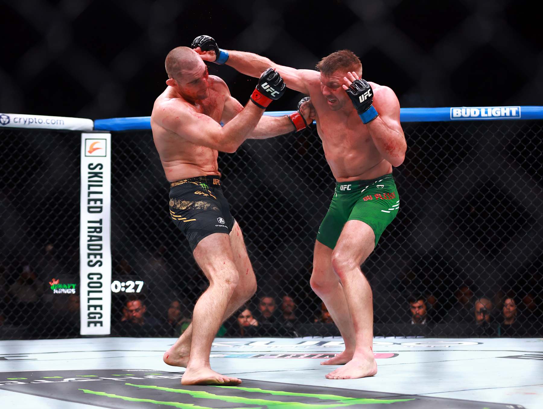 Sean Strickland (left) and Dricus Du Plessis trade punches.