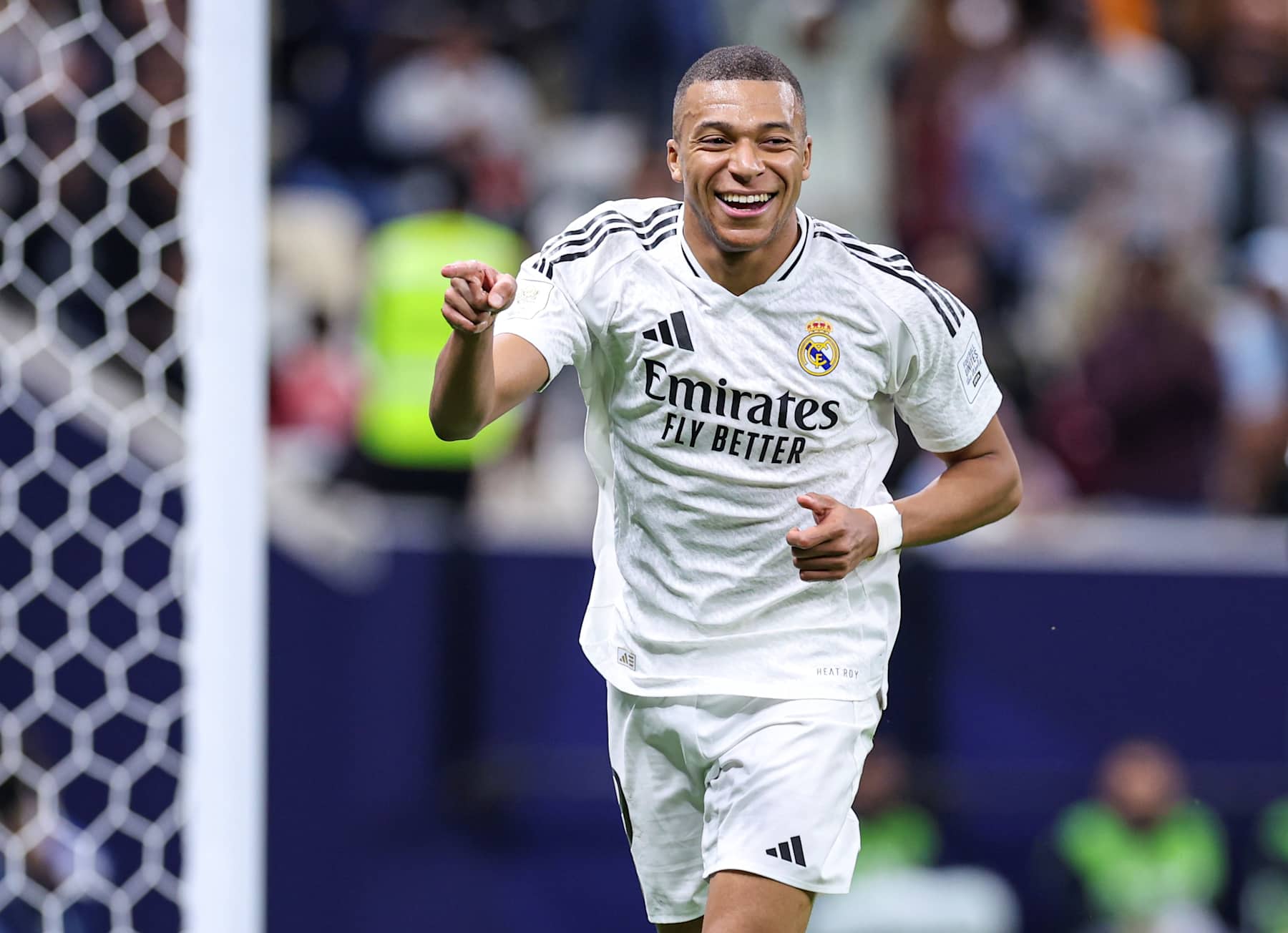 Kylian Mbappe of Real Madrid celebrates after scoring the opening goal during the FIFA Intercontinental Cup Qatar 2024 Final match between Spain's Real Madrid and Mexico's CF Pachuca at Lusail Stadium in Lusail, Qatar, on Dec. 18, 2024. (Photo by Nikku/Xinhua via Getty Images)