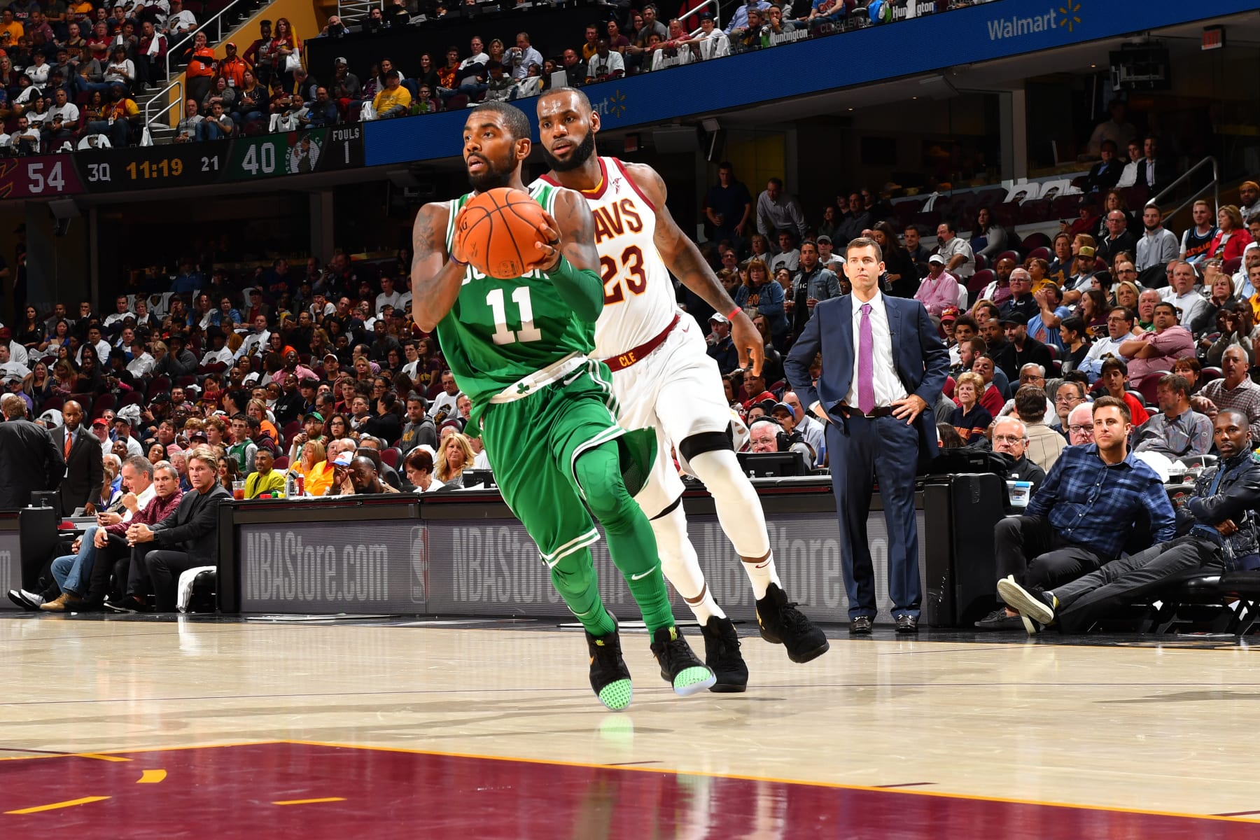 CLEVELAND, OH - OCTOBER 17:  Kyrie Irving #11 of the Boston Celtics drives to the basket around LeBron James #23 of the Cleveland Cavaliers on October 17, 2017 at Quicken Loans Arena in Cleveland, Ohio. NOTE TO USER: User expressly acknowledges and agrees that, by downloading and/or using this Photograph, user is consenting to the terms and conditions of the Getty Images License Agreement. Mandatory Copyright Notice: Copyright 2017 NBAE (Photo by Jesse D. Garrabrant/NBAE via Getty Images)