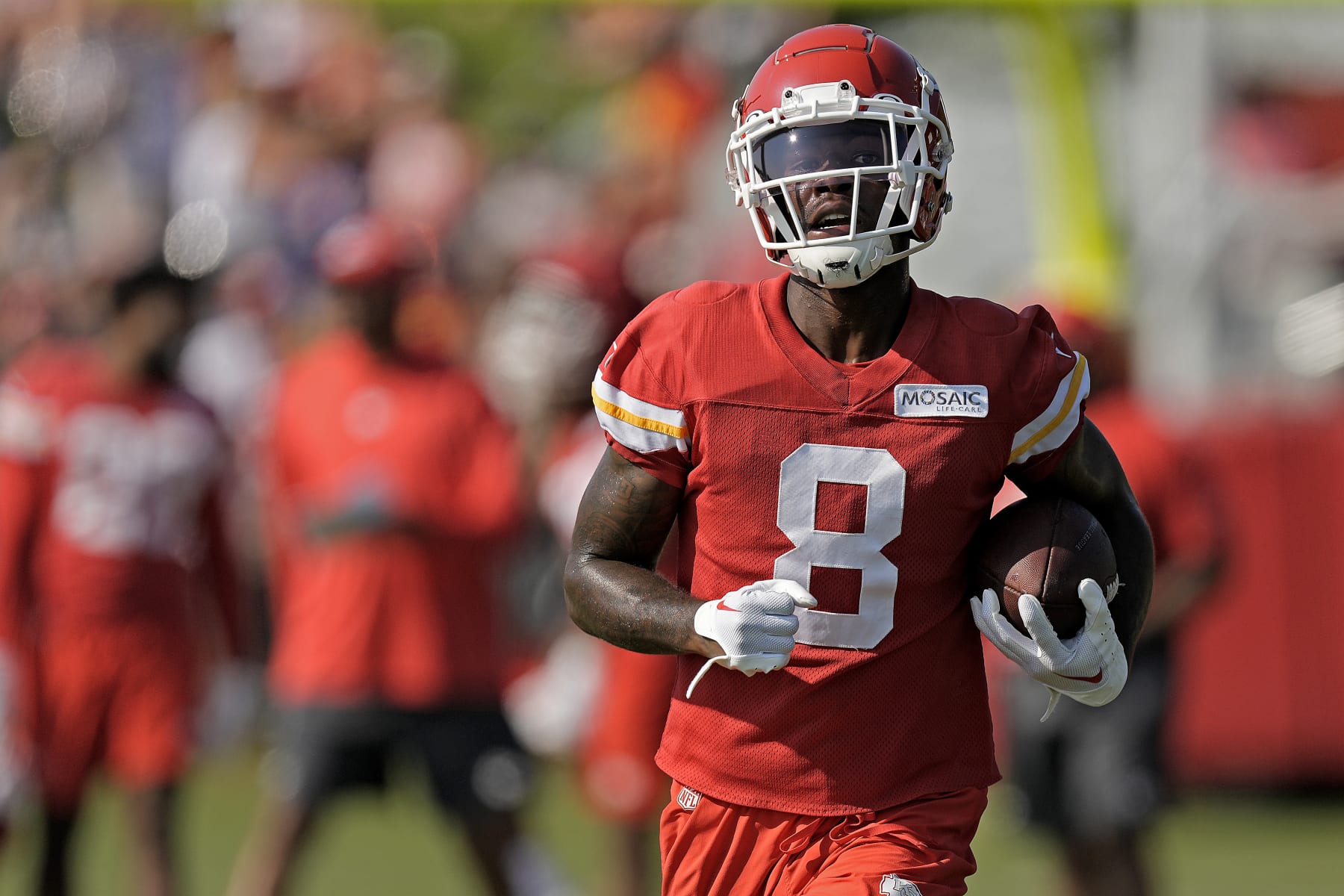 Kansas City Chiefs wide receiver Justyn Ross runs the ball during NFL football training camp Sunday, July 23, 2023, in St. Joseph, Mo. (AP Photo/Charlie Riedel)