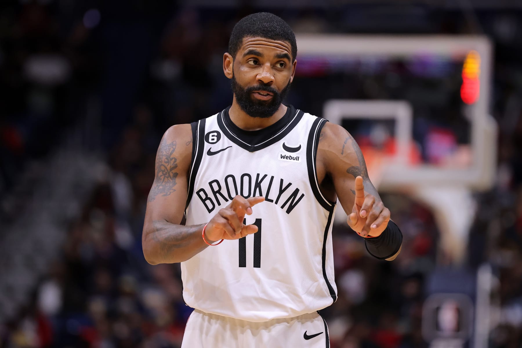 NEW ORLEANS, LOUISIANA - JANUARY 06: Kyrie Irving #11 of the Brooklyn Nets reacts against the New Orleans Pelicans during a game at the Smoothie King Center on January 06, 2023 in New Orleans, Louisiana. NOTE TO USER: User expressly acknowledges and agrees that, by downloading and or using this Photograph, user is consenting to the terms and conditions of the Getty Images License Agreement. (Photo by Jonathan Bachman/Getty Images)