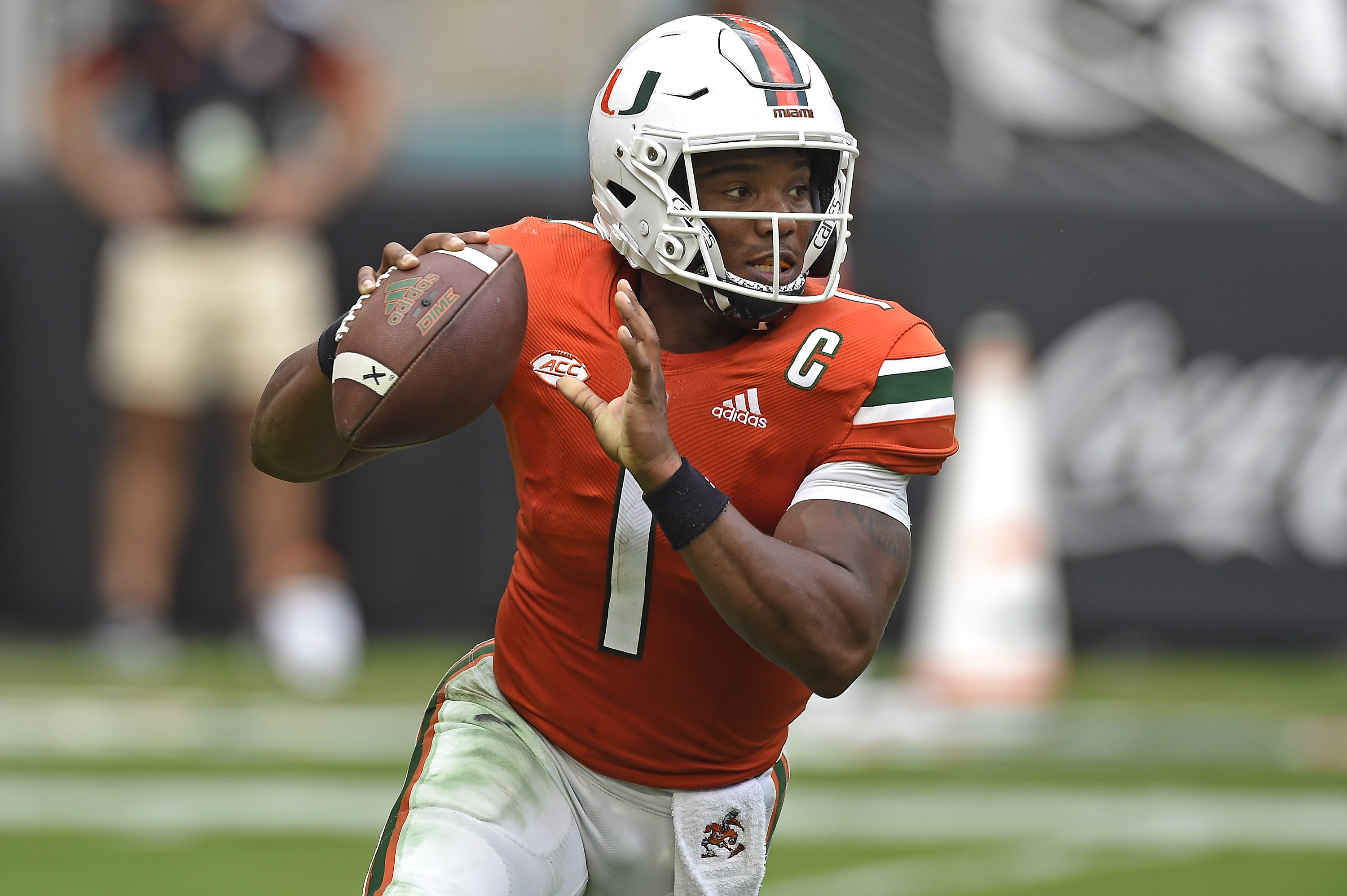 MIAMI GARDENS, FL - SEPTEMBER 18:  Miami quarterback D'Eriq King (1) looks for a receiver downfield in the third quarter as the University of Miami Hurricanes faced the Michigan State University Spartans on September 18, 2021, at Hard Rock Stadium in Miami Gardens, Florida. (Photo by Samuel Lewis/Icon Sportswire via Getty Images)