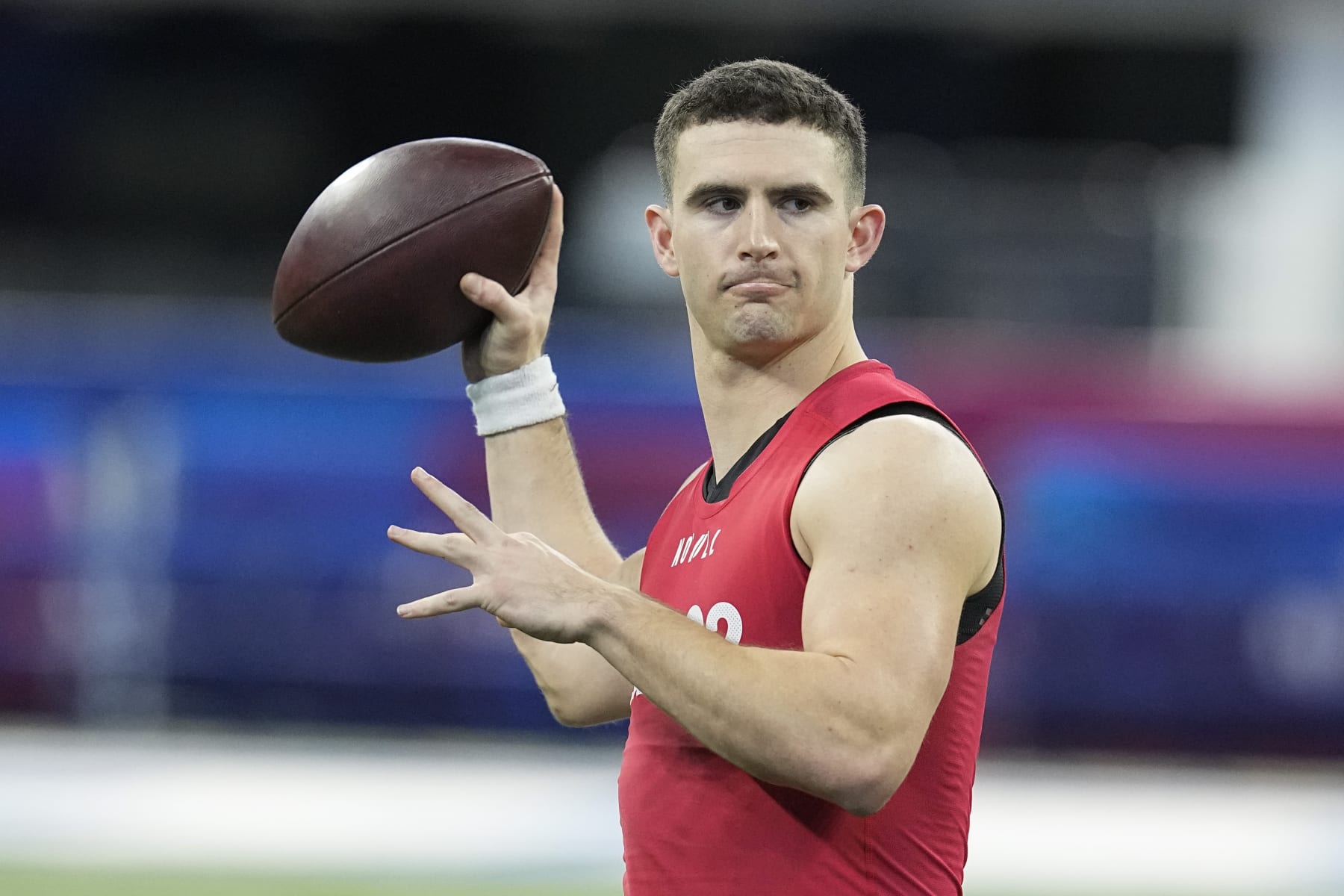 Georgia quarterback Stetson Bennett runs a drill at the NFL football scouting combine in Indianapolis, Saturday, March 4, 2023. (AP Photo/Darron Cummings)