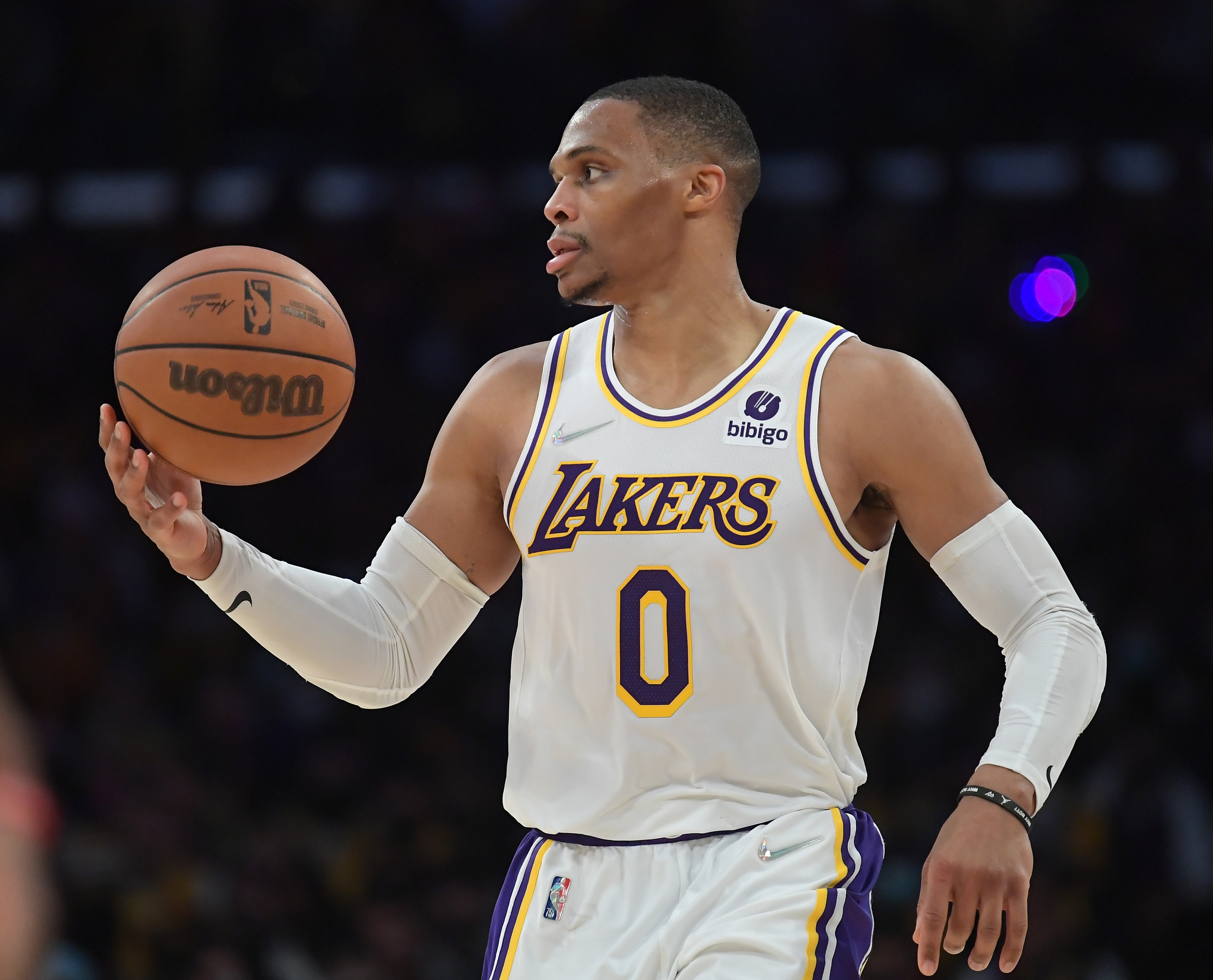LOS ANGELES, CA - DECEMBER 25:  Russell Westbrook #0 of the Los Angeles Lakers takes the ball down court during the game against the Brooklyn Nets at Crypto.com Arena on December 25, 2021 in Los Angeles, California. NOTE TO USER: User expressly acknowledges and agrees that, by downloading and/or using this Photograph, user is consenting to the terms and conditions of the Getty Images License Agreement.   (Photo by Jayne Kamin-Oncea/Getty Images)