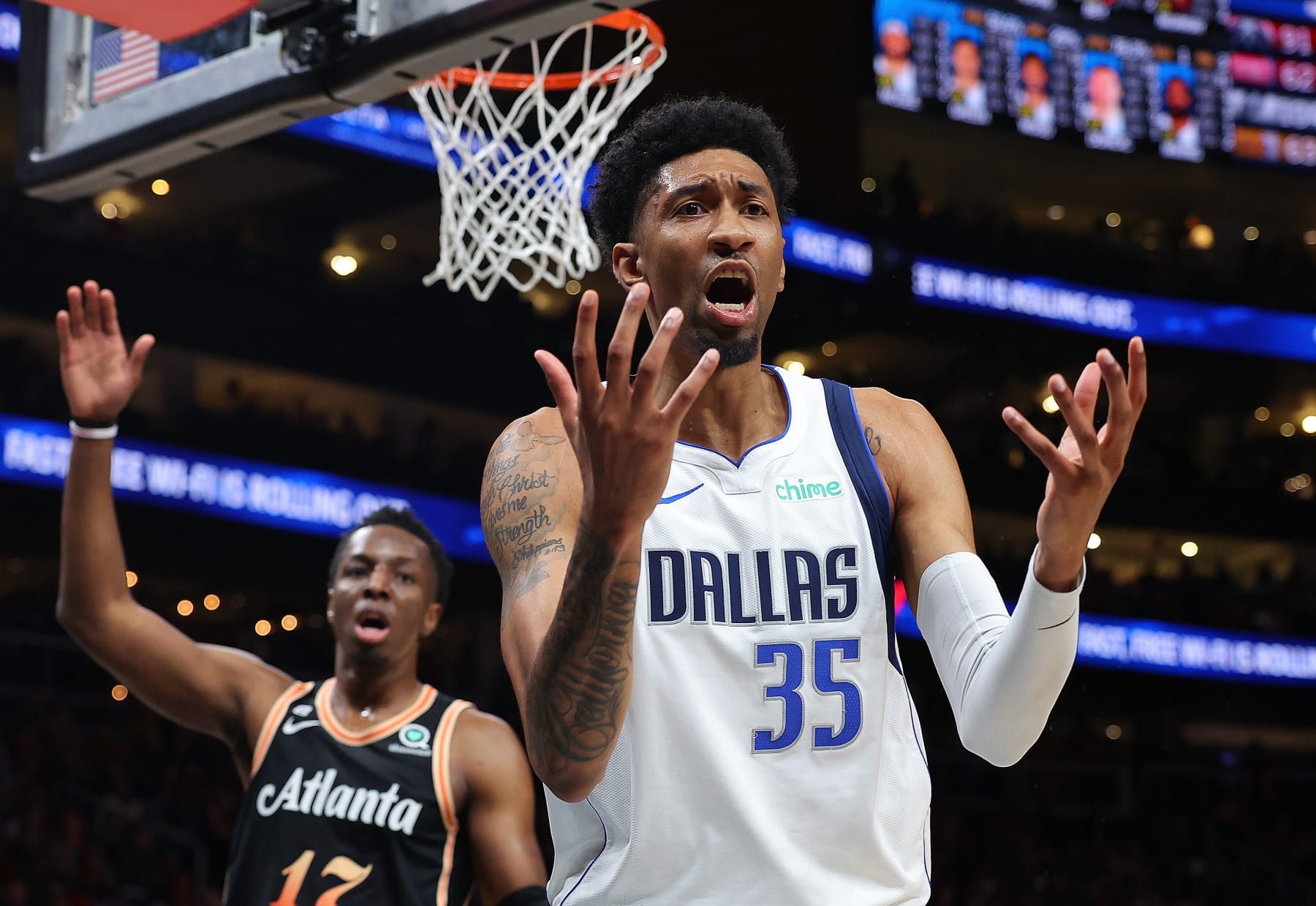 ATLANTA, GEORGIA - APRIL 02:  Christian Wood #35 of the Dallas Mavericks reacts after being charged with a foul against the Atlanta Hawks during the fourth quarter at State Farm Arena on April 02, 2023 in Atlanta, Georgia.  NOTE TO USER: User expressly acknowledges and agrees that, by downloading and or using this photograph, User is consenting to the terms and conditions of the Getty Images License Agreement.  (Photo by Kevin C. Cox/Getty Images)